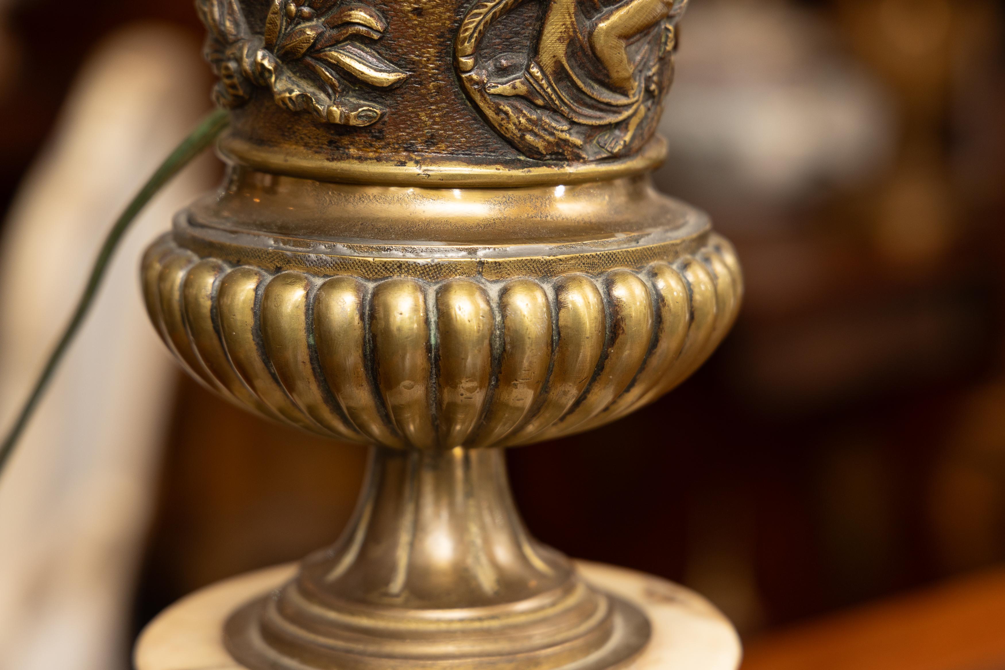 Greco Roman Pair of 19th Century Bronzed Metal Urns With Marble Bases, electrified For Sale