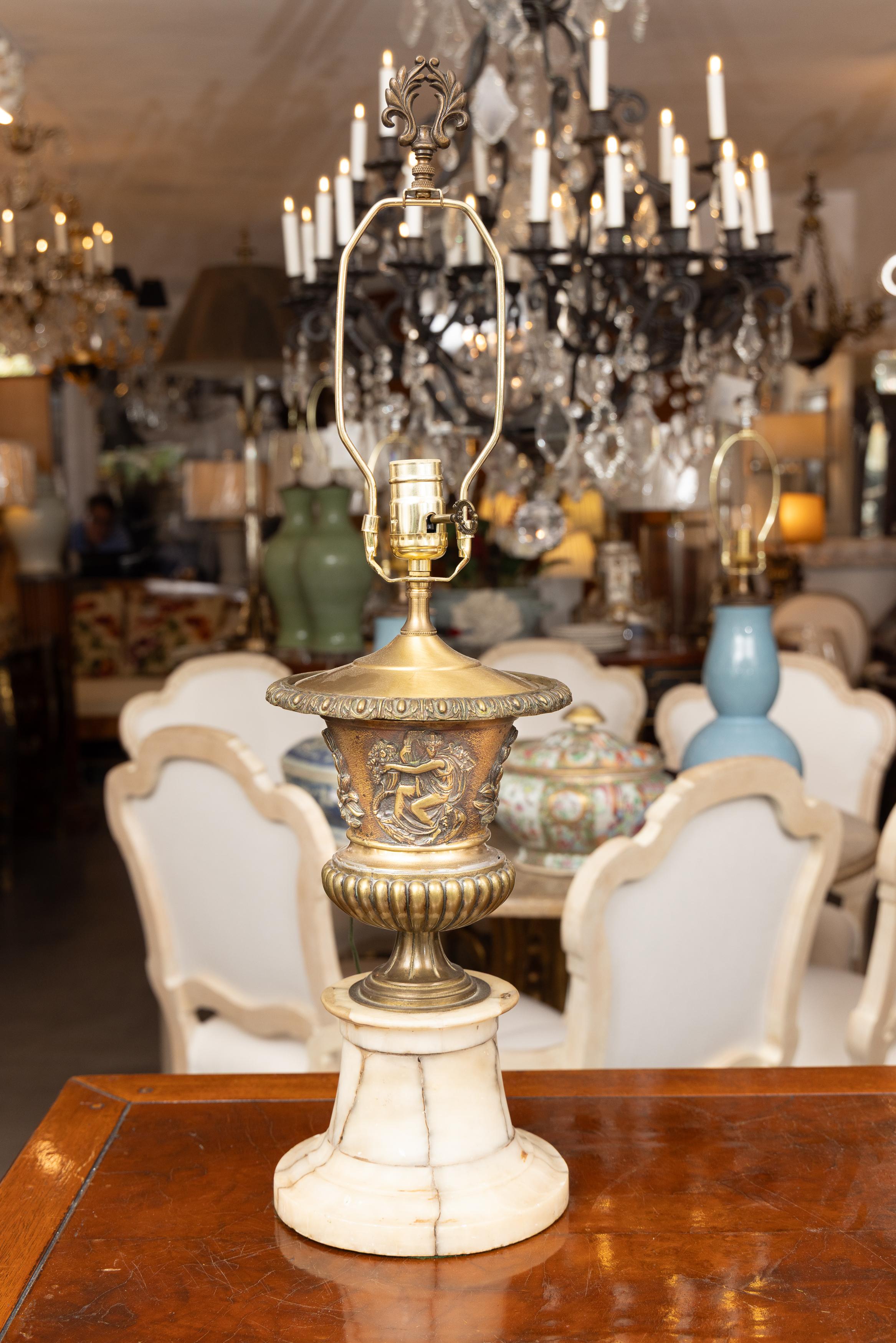 Late 19th Century Pair of 19th Century Bronzed Metal Urns With Marble Bases, electrified For Sale