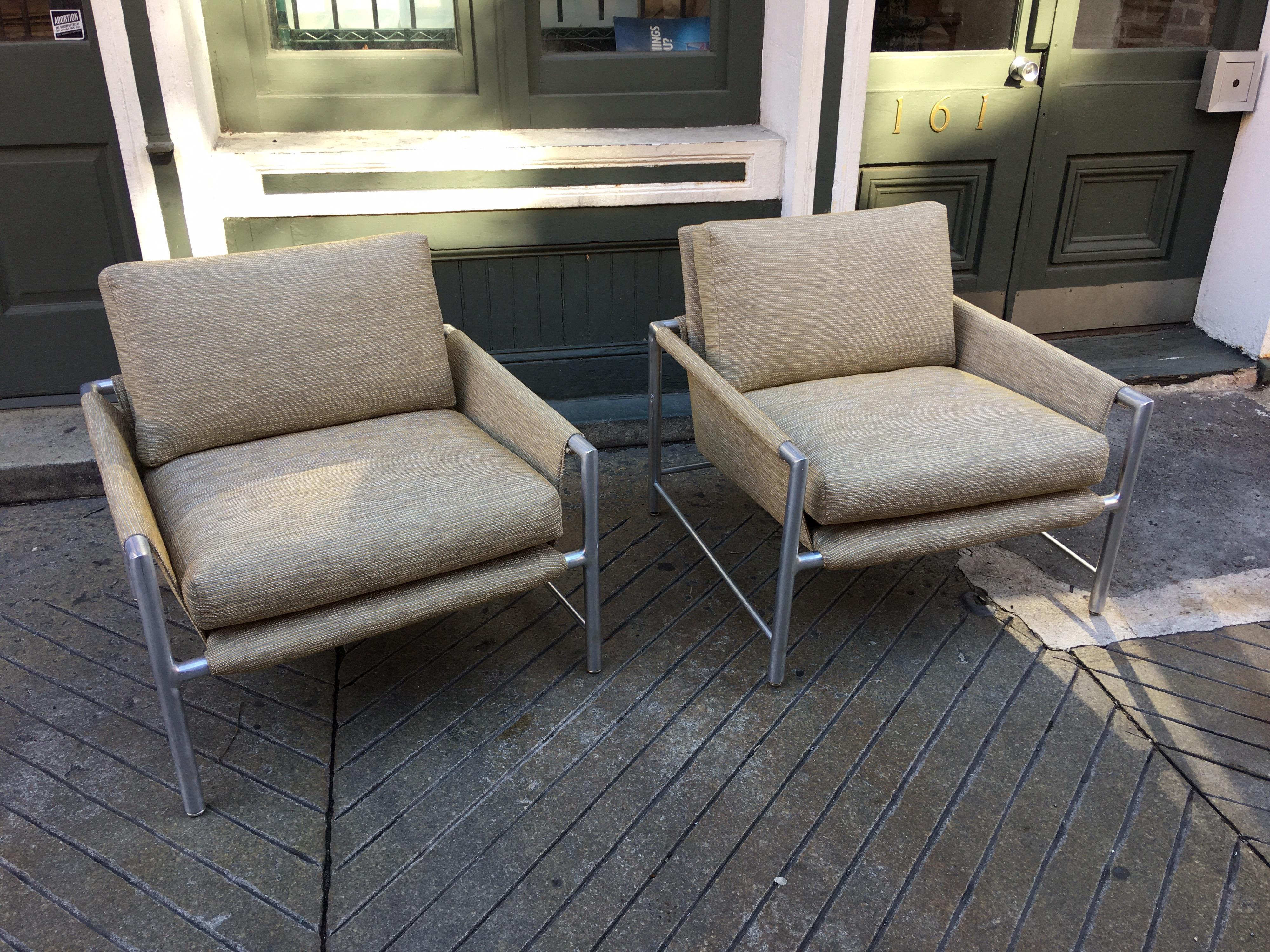 Pair of founders furniture aluminum lounge chairs. Newly re-upholstered and ready to go! Aluminum frames are very solid and all welds are very nicely done. Elegant Design, looking good from all sides!