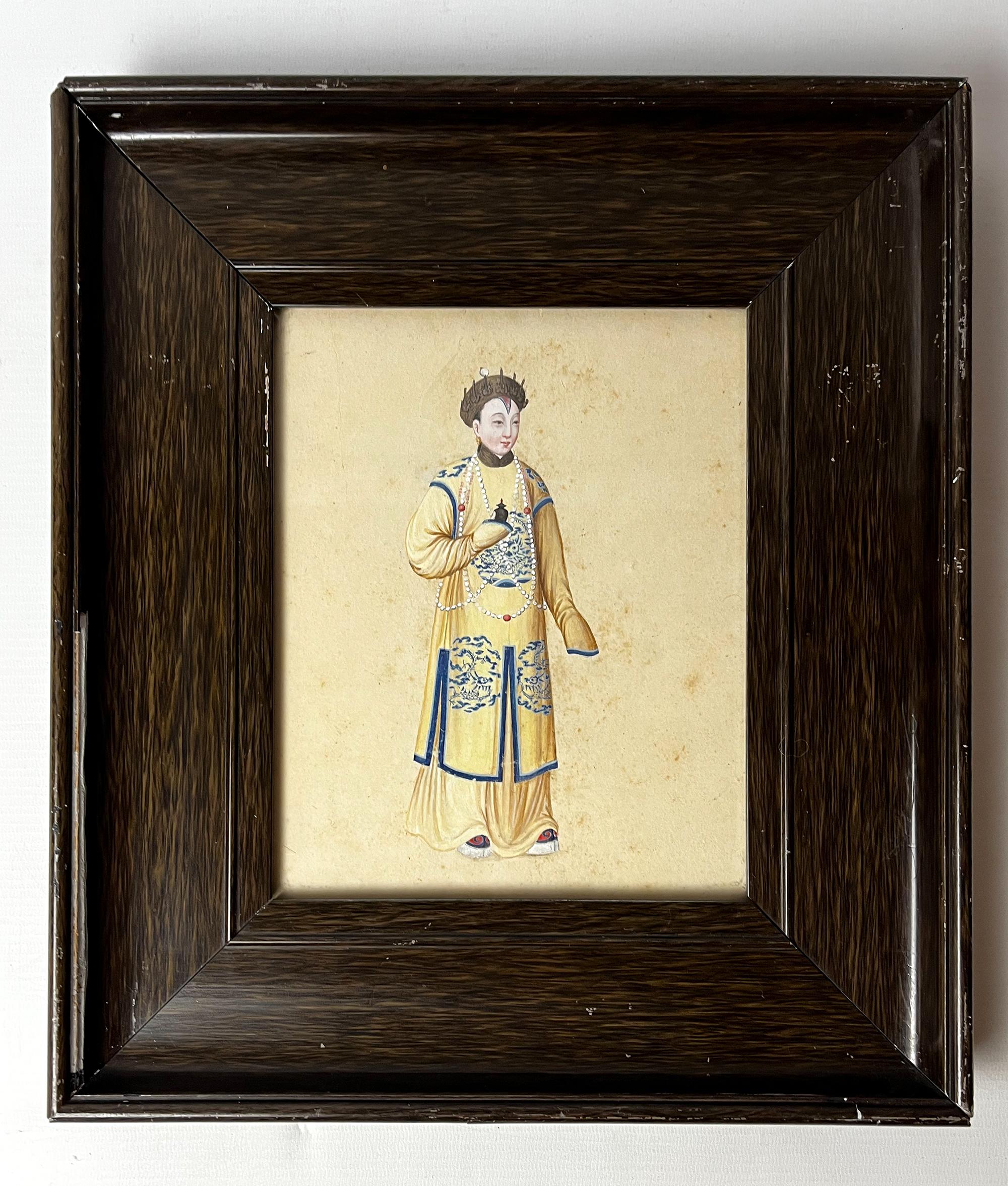 Two Chinese paintings of figures in court dress

19th century, opaque pigments on paper, each depicting a figure wearing robes decorated with dragon motifs on yellow-grounds.

Produced in the 19th century for export to Europe, through the great