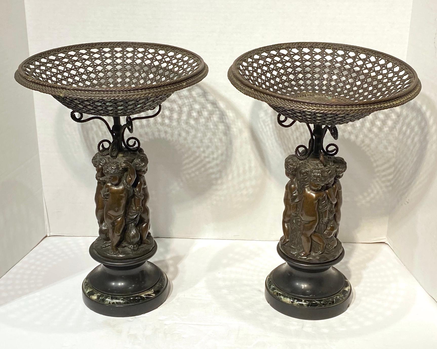 Carved Pair of French 19th Century Bronze Corbeilles Depicting Cupids For Sale
