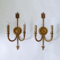 Pair French 1940s Neo-classic arrow shaped brass wall lamps