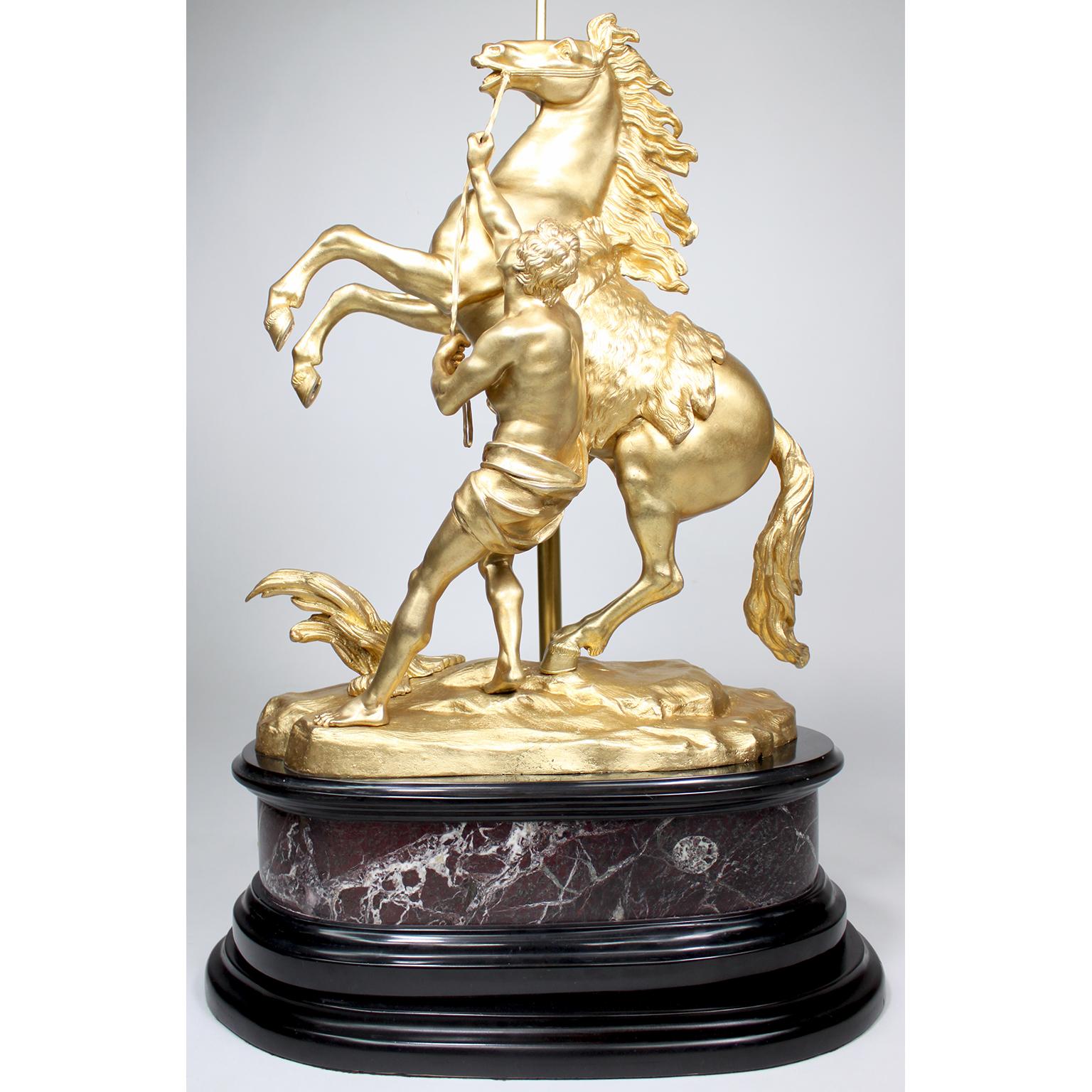 Carved Pair French 19th/20th Century Gilt-Bronze Sculptures of The Marly Horses Lamps For Sale