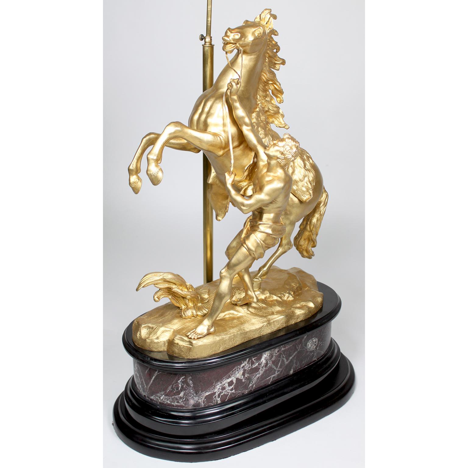 Early 20th Century Pair French 19th/20th Century Gilt-Bronze Sculptures of The Marly Horses Lamps For Sale