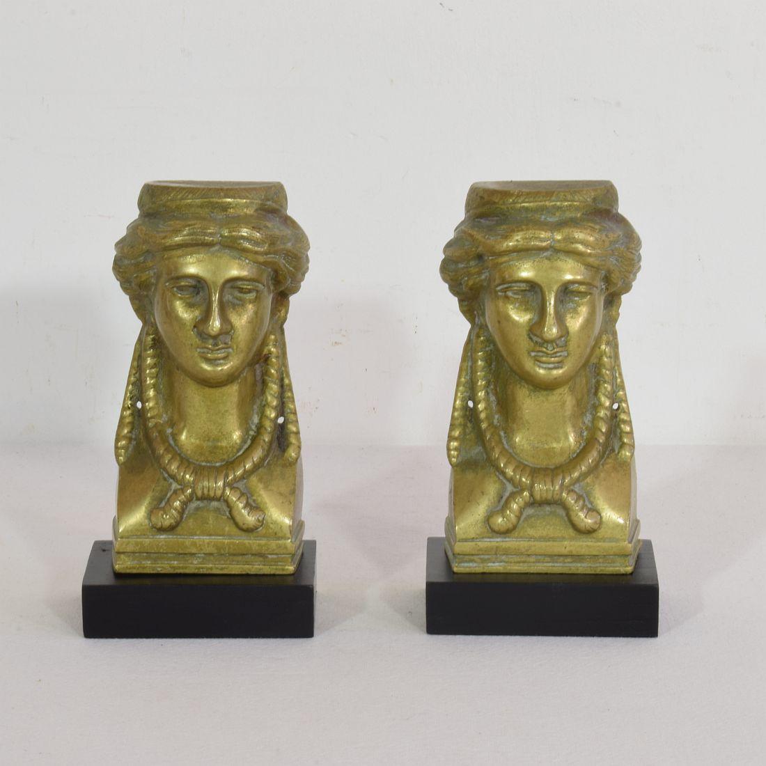 Beautiful pair of bronze Empire style head ornaments. Most likely once adorned a stunning armoire or table
France circa 1800-1850.
Measurements individual and include the wooden base.