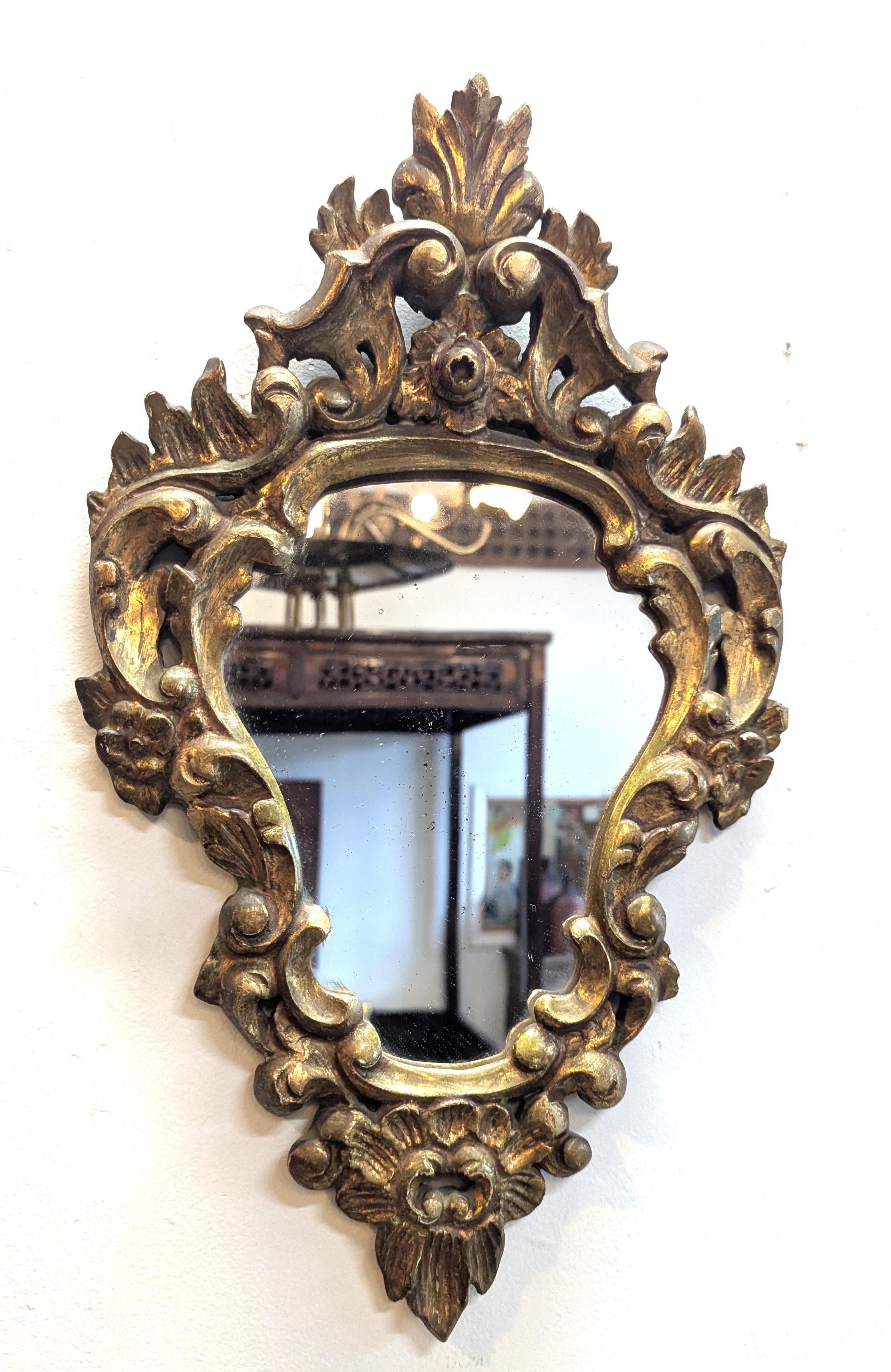 Matched pair of French Antique Baroque Carved Gilt Mirrors.  Wonderful pair of French Baroque style carved gilded mirrors.  Fruitwood with Gesso and gilding, in very good condition.  Late 19th century with antique glass showing wear to the