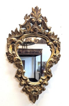 Paire de miroirs français du 19ème siècle, sculptés, baroques et dorés