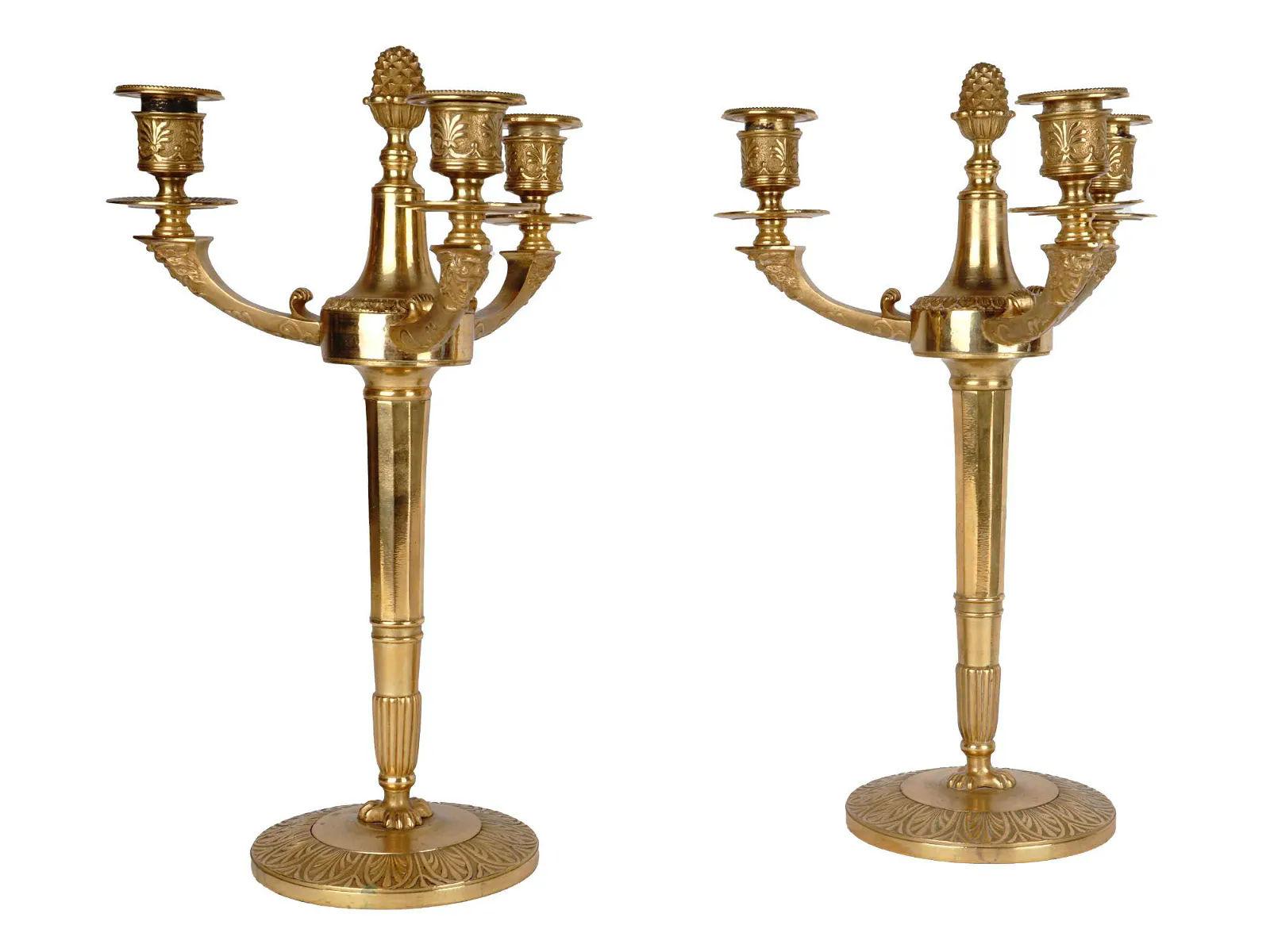 Pair of exceptional French 19th century three-light gilt bronze candelabra in the Empire style, circa 1860s. 

