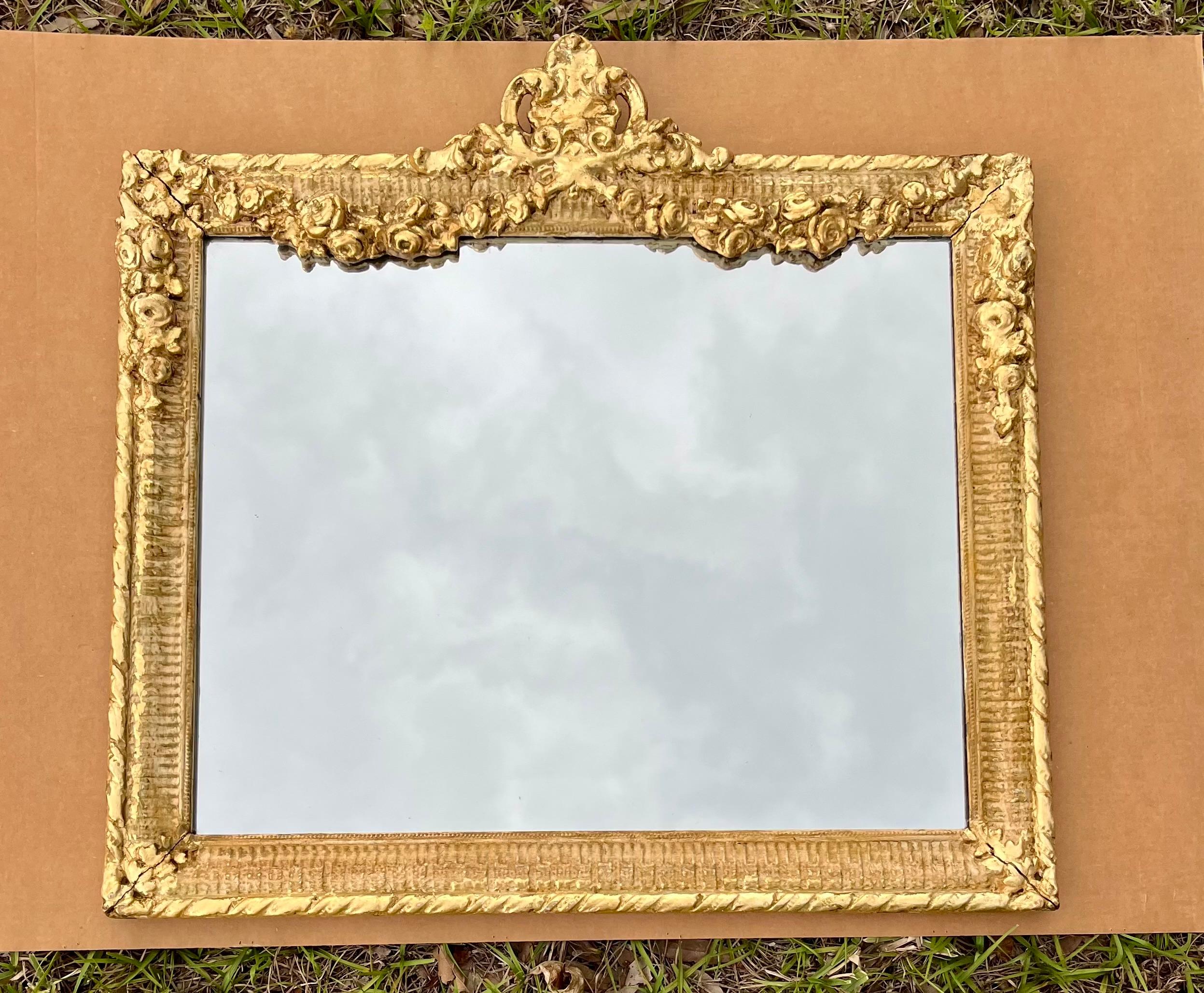 Pair French 19th Century Louis XIV Style Gilded Mirrors

Very fine 19th century antique French Louis XIV style giltwood rectangular mirrors. The baroque style delicate wood and gesso carved frames are decorated with flowers and foliage. They are