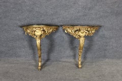 Pair of 18th Century French Rococo Louis XV Carved Gilt Wood Marble Top Consoles