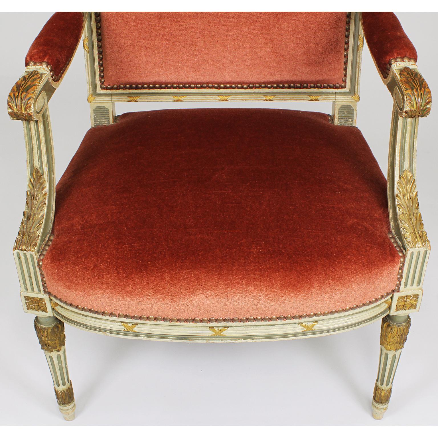 Early 20th Century Pair of French Louis XVI Style Gilt, Cream /Green Painted Fauteuils Armchairs For Sale