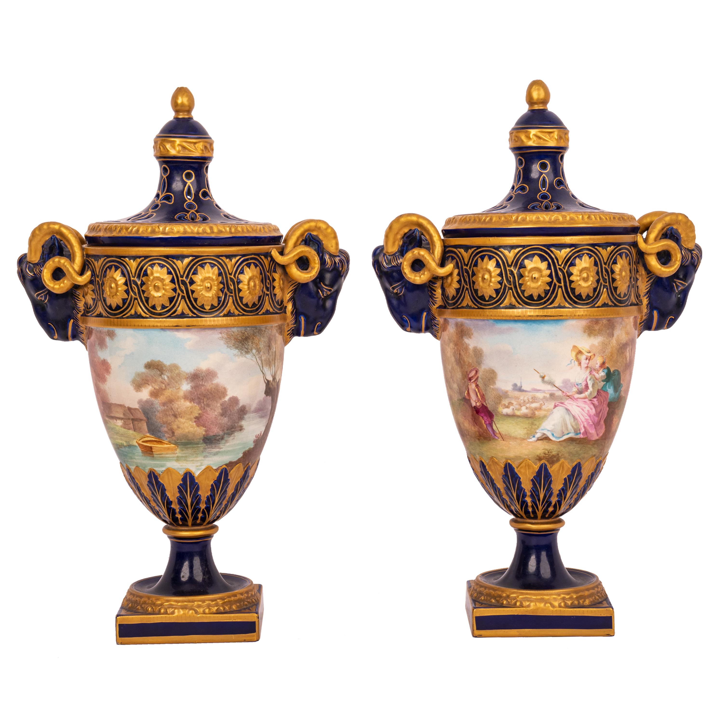 A very fine pair of antique 19th century French handpainted porcelain style pot-pourri urns, Veuve Perrin, Marseilles.
The urns were designed to receive fragrant pot pourri, each lid is surmounted with a gilded acorn shape finial and having pierced