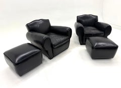 Pair French Art Deco Black Leather Lounge Chairs with Matching Ottomans.