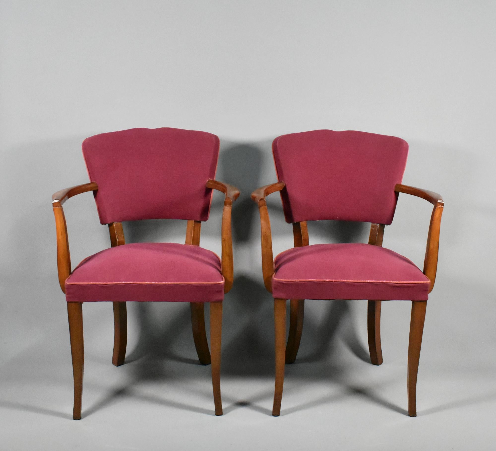 Pair French Art Deco Moustache Bridge Chairs 

An elegant matching pair of Pair French Art Deco Moustache Bridge Chairs, presented in their original burgundy upholstery with piped edging. 

The chairs feature gently out-swept legs and elegant, bowed