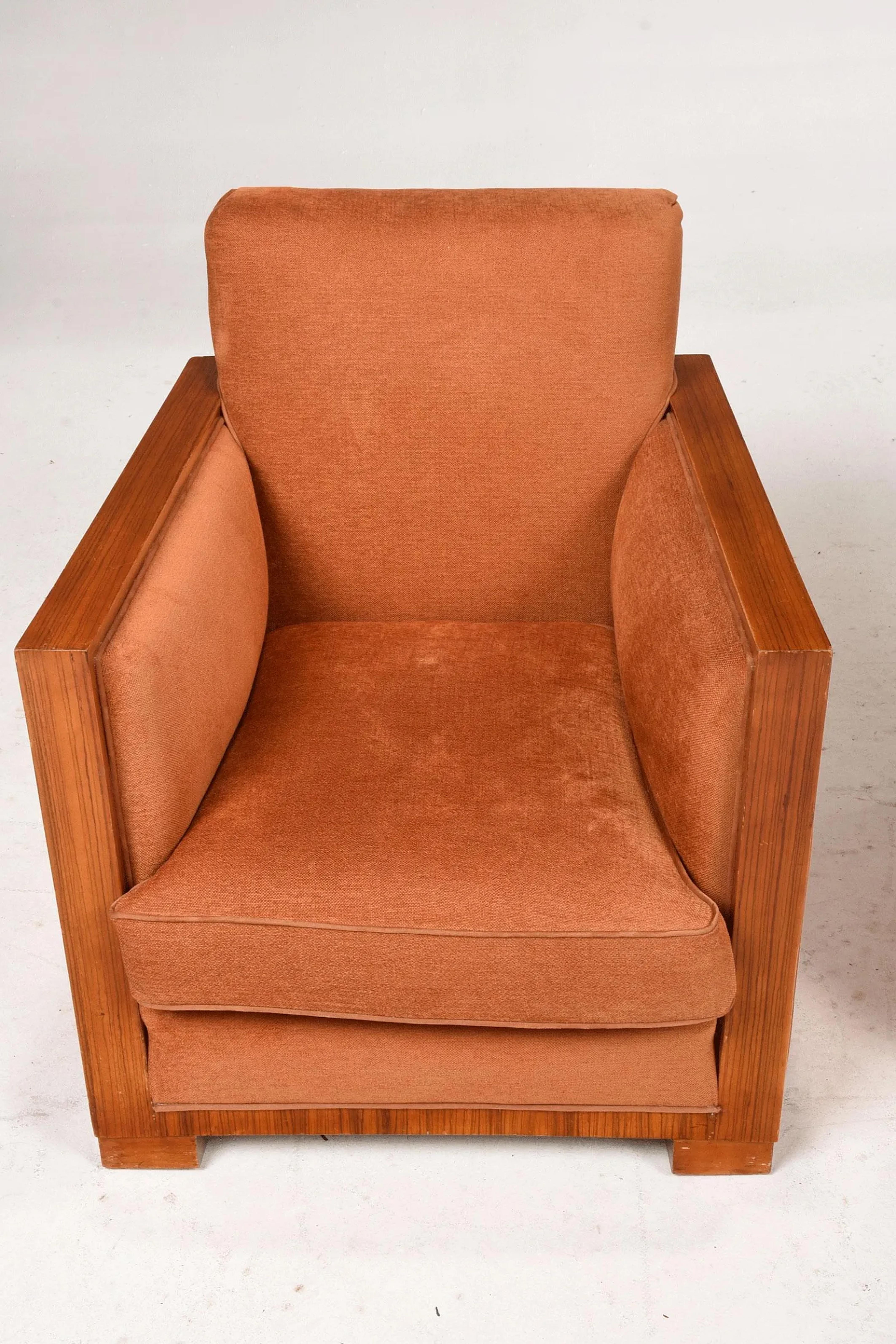 Pair French Art Deco Period walnut Armchairs decorated with a rust color velvet upholstery.
Provenance: Christie's New York, June 9, 1998 (lot 155) Eli and Edythe Broad; Private Collection, New York