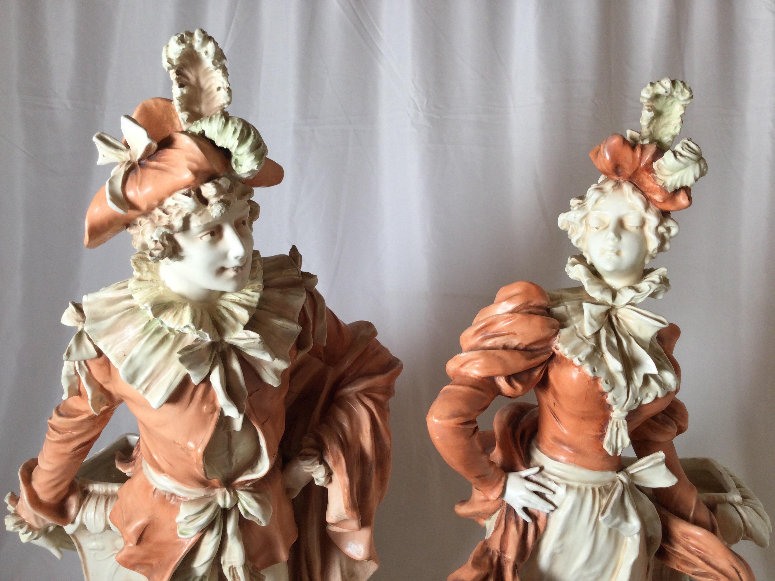 Pair of French Art Nouveau porcelain large figural vases. Very impressive size standing 31 1/2