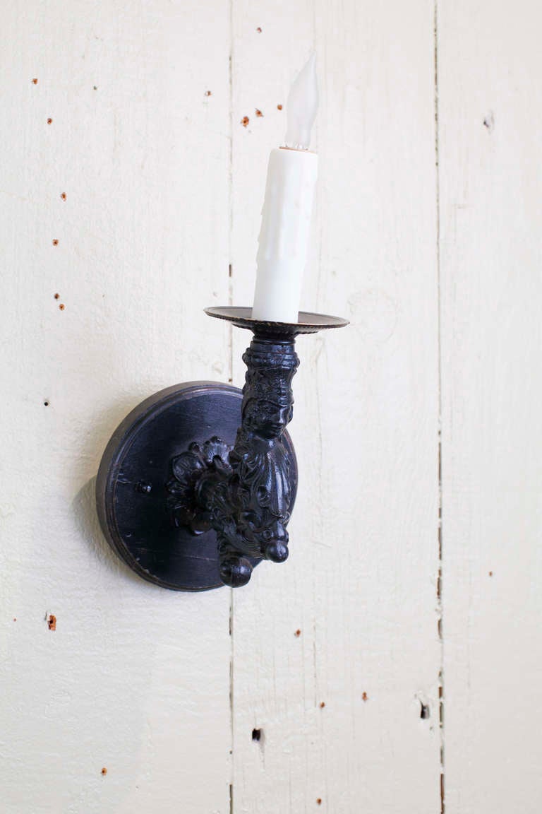 Hand-Painted Pair of Antique, French Black Iron Figural Wall Sconces For Sale