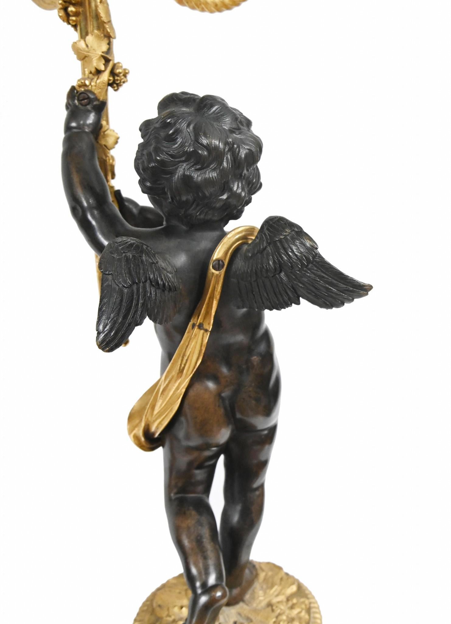 Stile provenzale Coppia di candelabri Cherub in bronzo francese Clodion in vendita