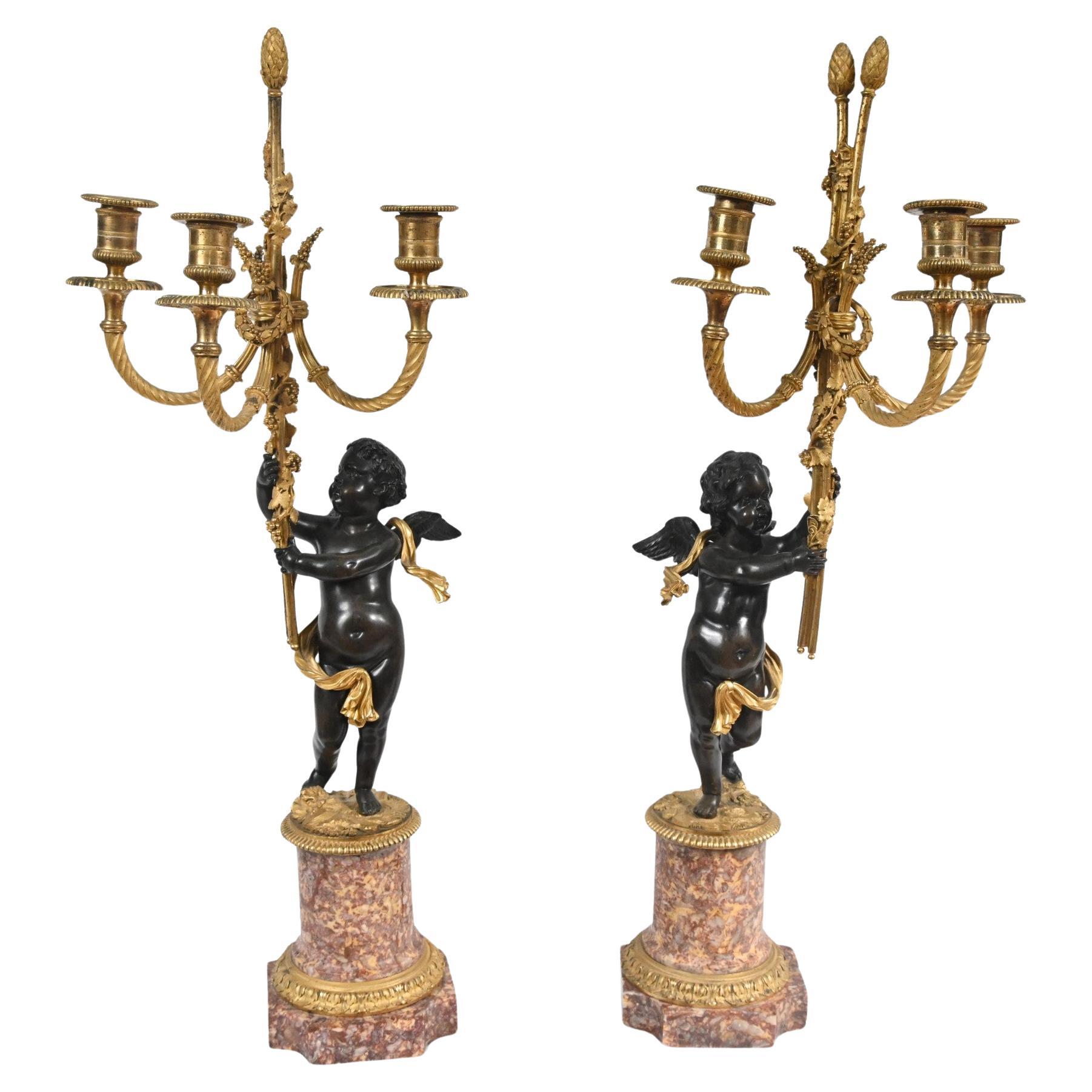 Paire de candélabres chérubins en bronze français Clodion