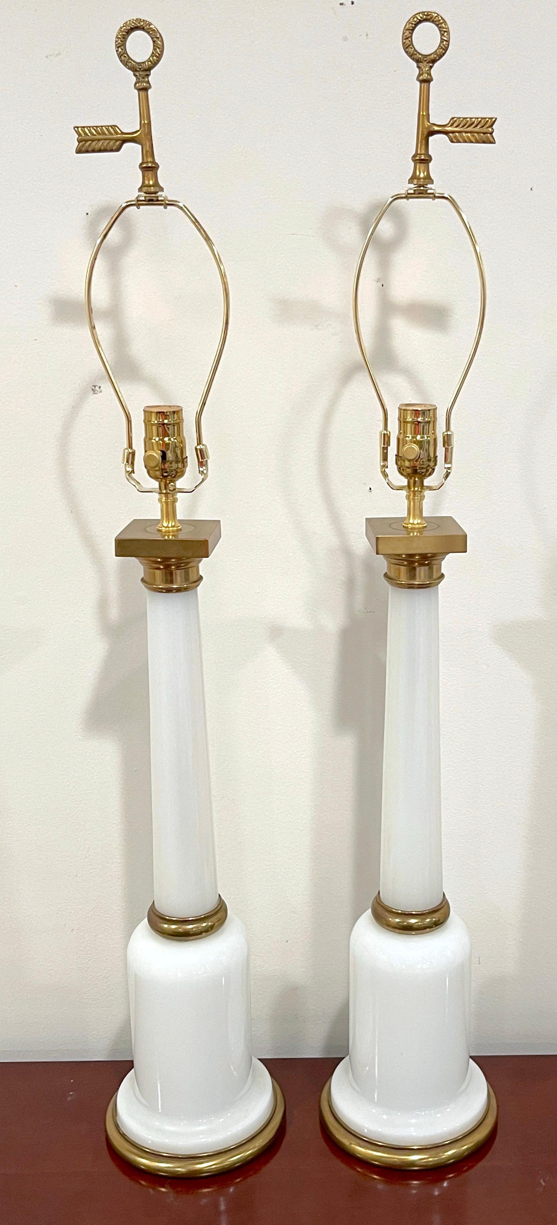 Pair French Bronze Mounted Neoclassical Column & Arrow Motif Opaline Lamps 
France, circa 1960s

Each one a tall and sleek architectural column, with a gilt bronze capital, fitted with optional Arrow/ Bouillotte finials. Rewired, ready to shade