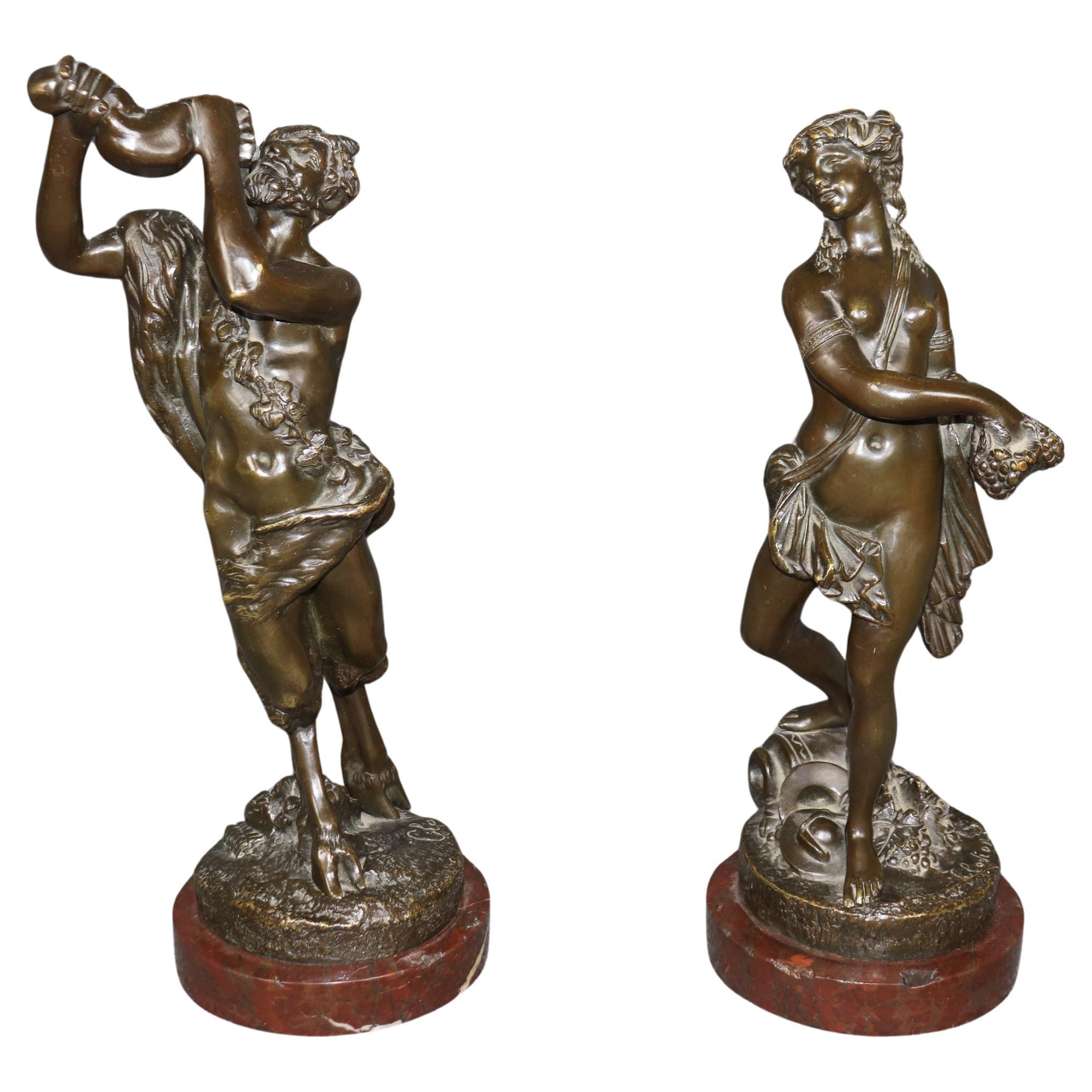 Coppia di sculture francesi in bronzo di Satiro e Dama Rouge con base in marmo di Clodio