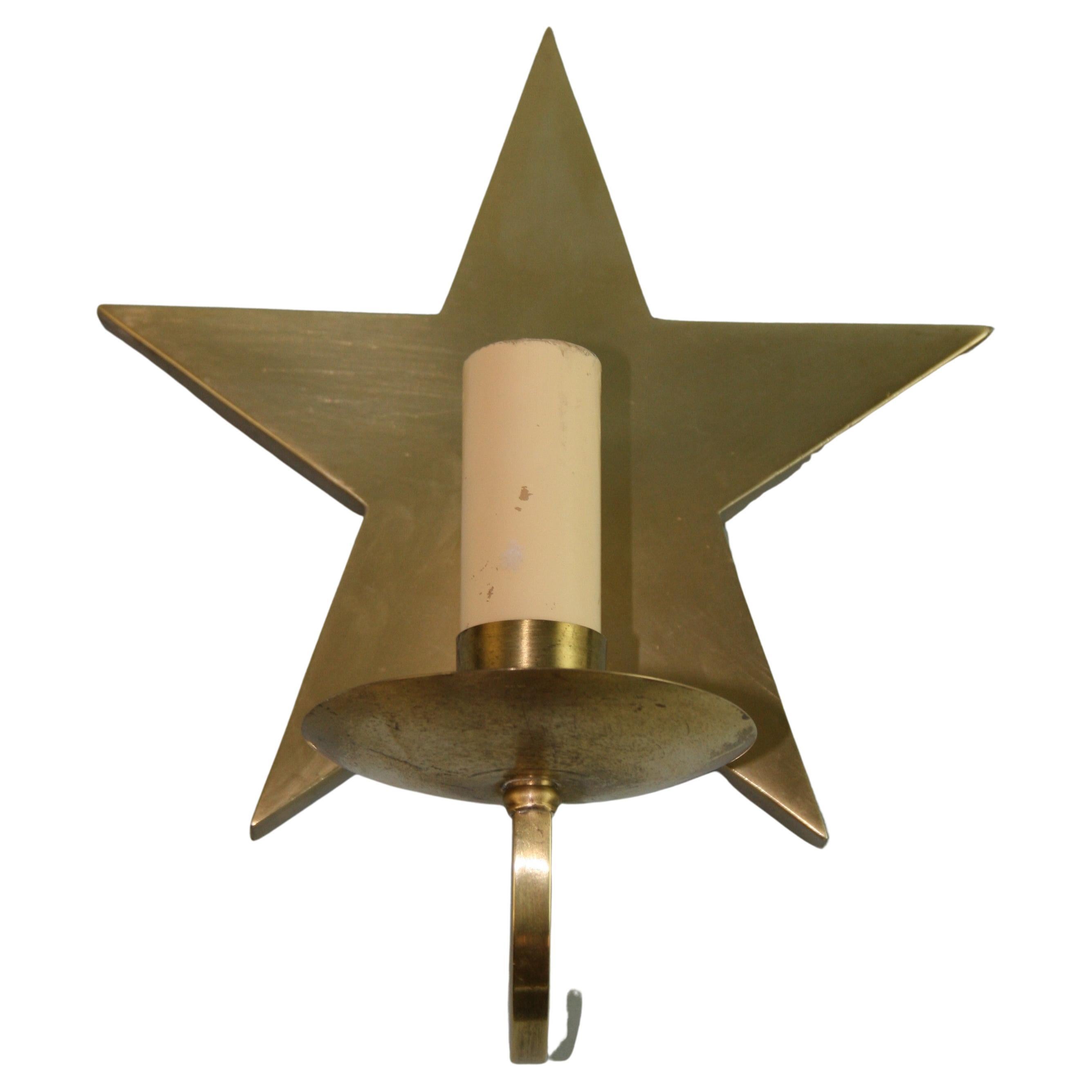 1399 Pair French bronze star wall sconces.