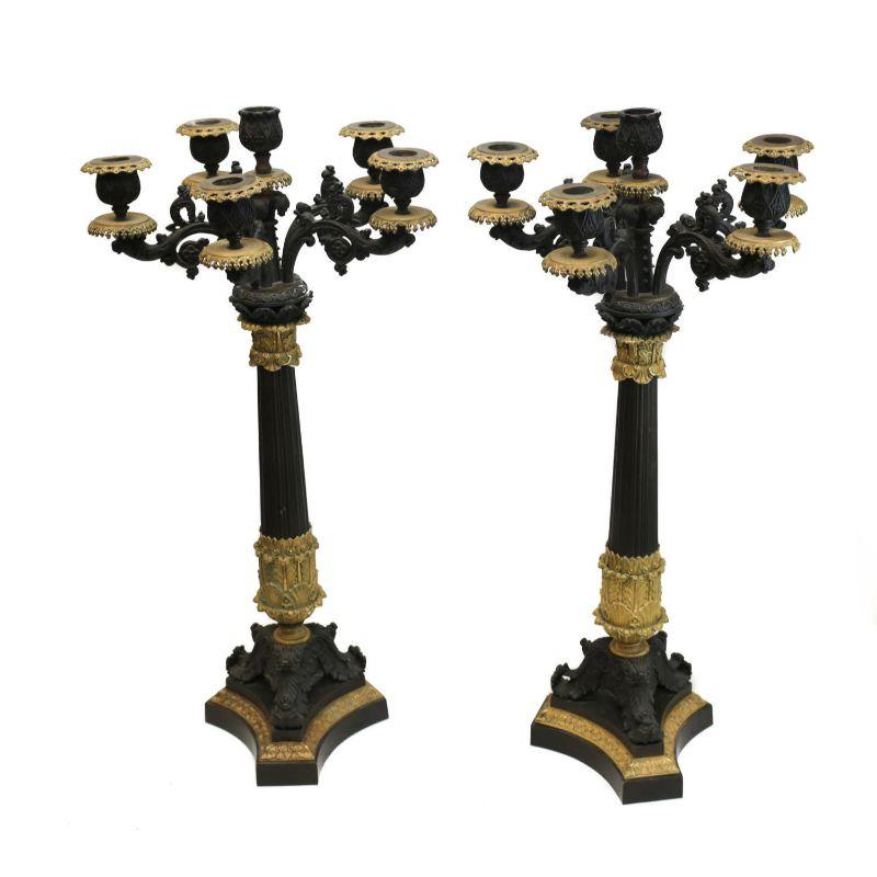 Pair French Charles X patinated gilt bronze 6 light candelabra, 19th century

Column stems with beautiful hand etched ornate foliate leaves throughout. Gilt bronze accents to the base, circular bands, an bobeches.

Additional