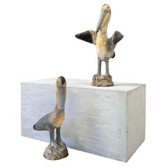 Paire de pélicans français en béton