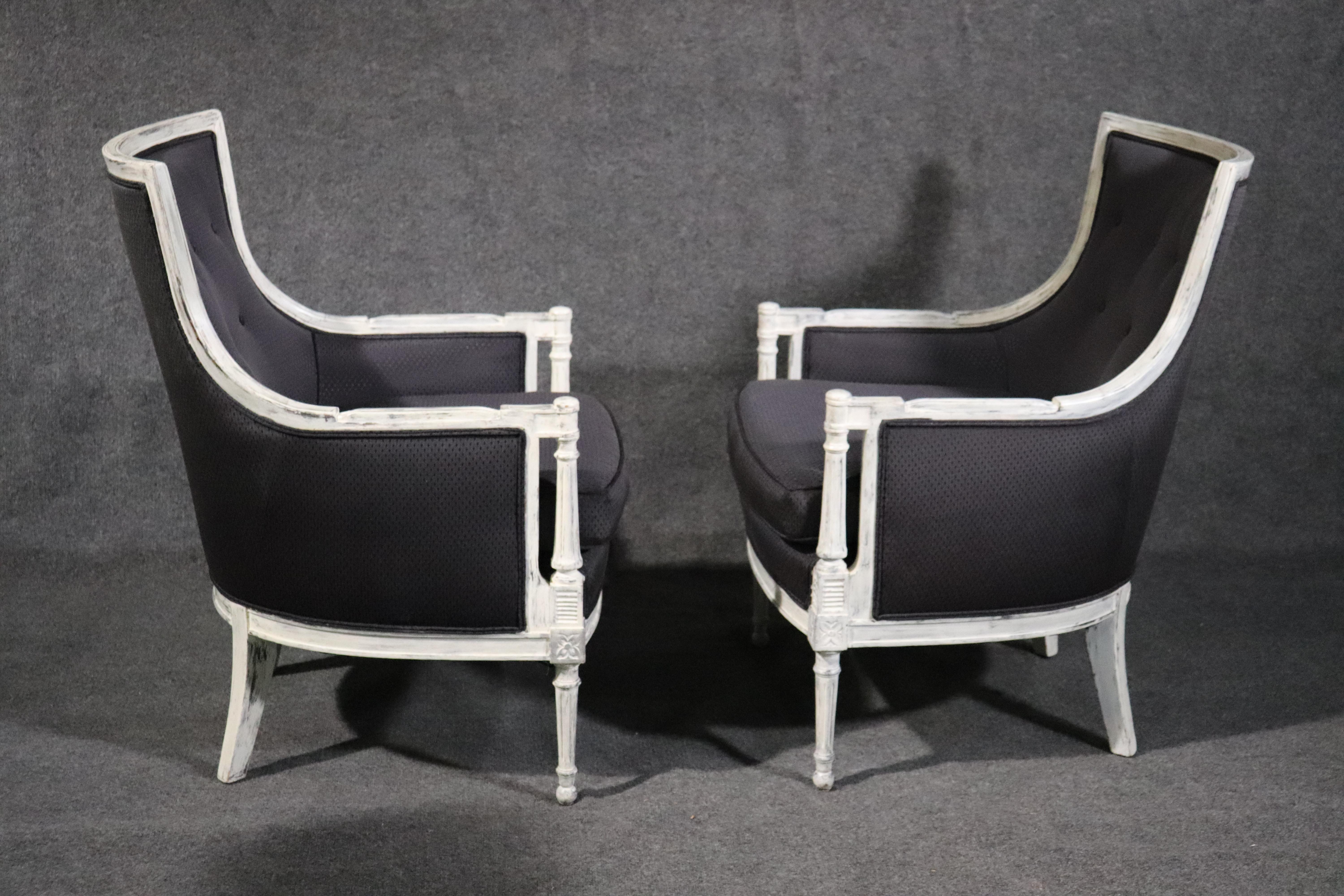Mid-20th Century Pair of Distressed Painted Black Upholstered French Louis XVI Bergère Chairs