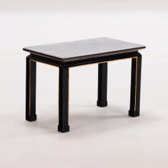 Pair French ebonized and giltwood end tables C 1950 in manner of James Mont.