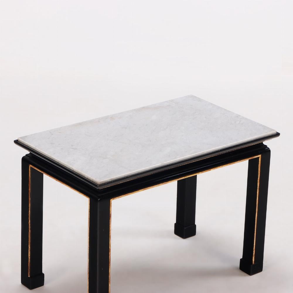 Ebonized Pair French ebonized and giltwood end tables C 1950 in manner of James Mont. For Sale