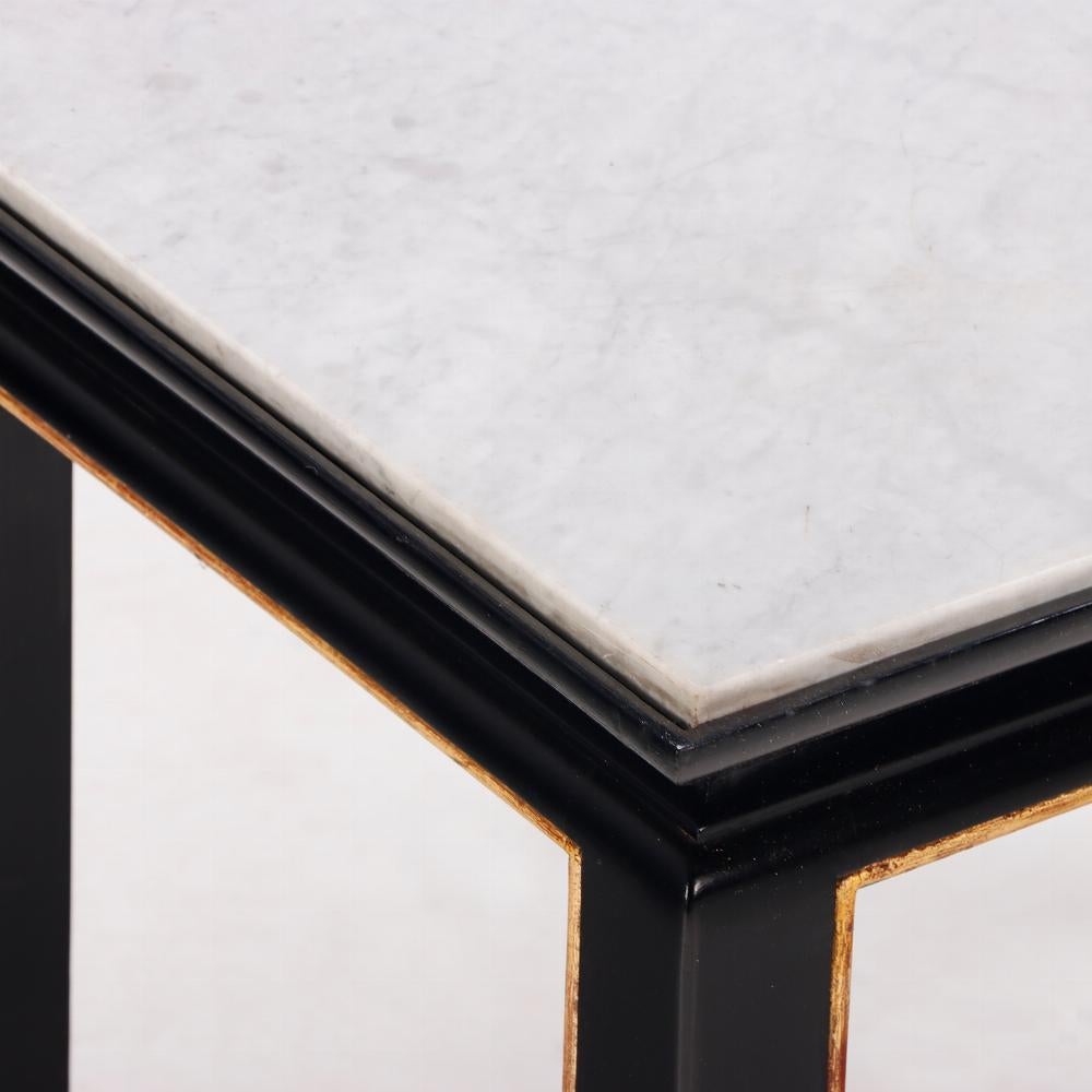 Pair French ebonized and giltwood end tables C 1950 in manner of James Mont. In Good Condition For Sale In Philadelphia, PA