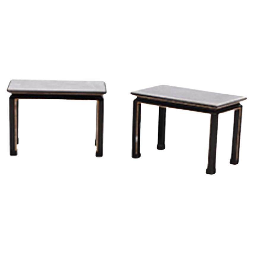 Pair French ebonized and giltwood end tables C 1950 in manner of James Mont.