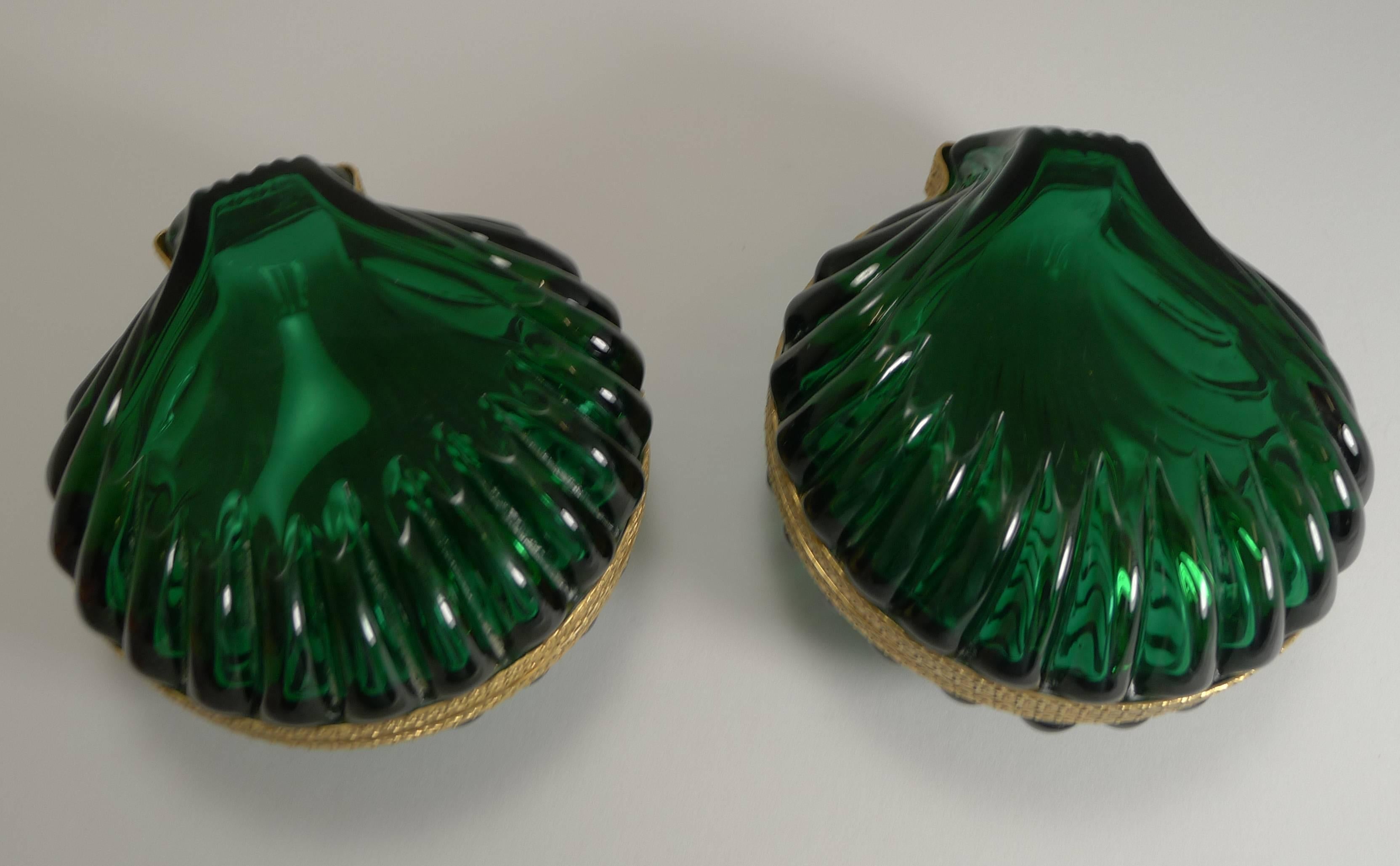 So very rare to find a pair of these and they are usually made from opaline glass, these though are made from a clear and vibrant Emerald green colour, really striking and colorful.

The beautiful and heavy crystal is trimmed in a dore bronze