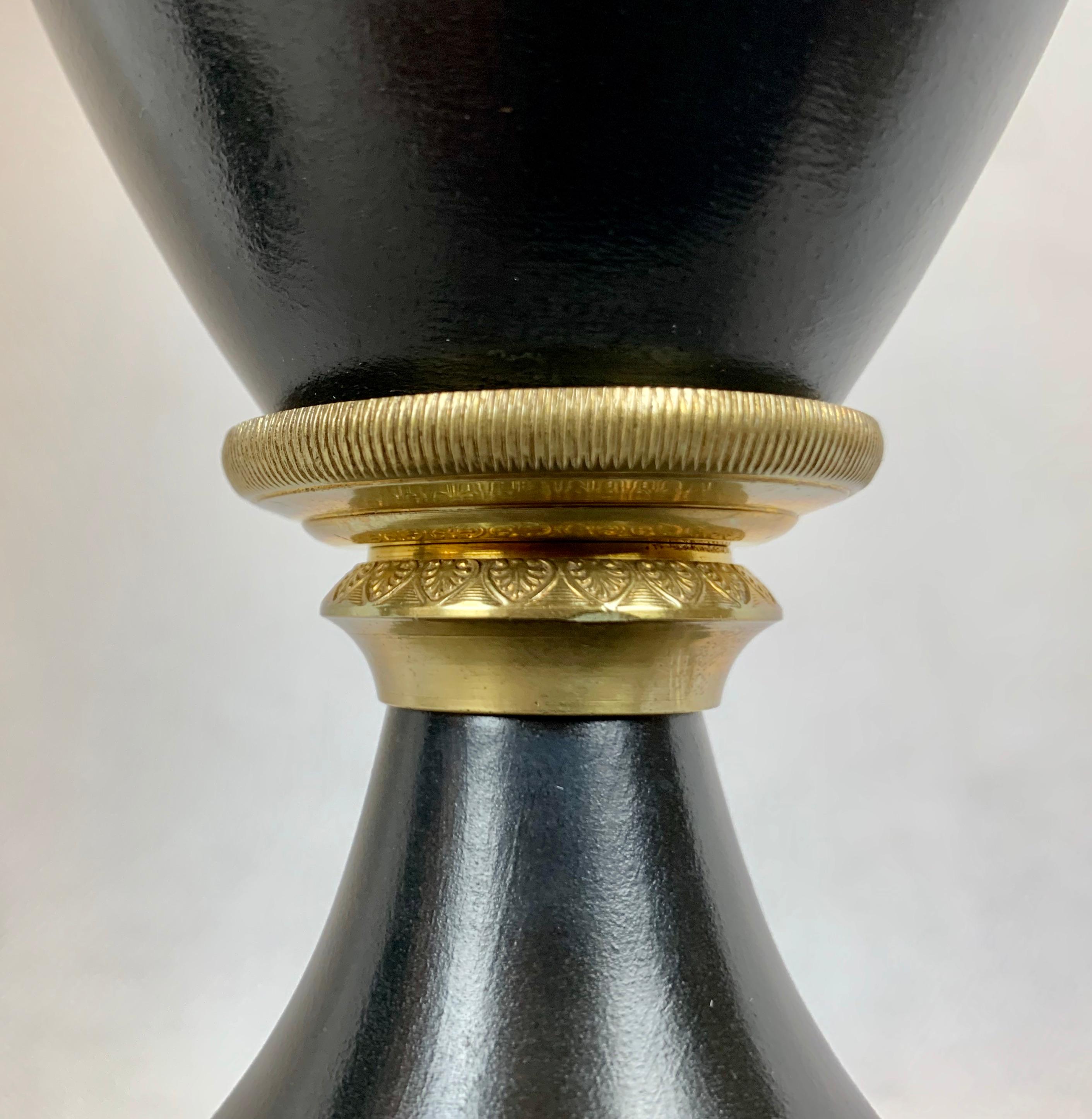 Metal A Pair of French Empire Black Enameled Lamps with Gilt Bronze Trim