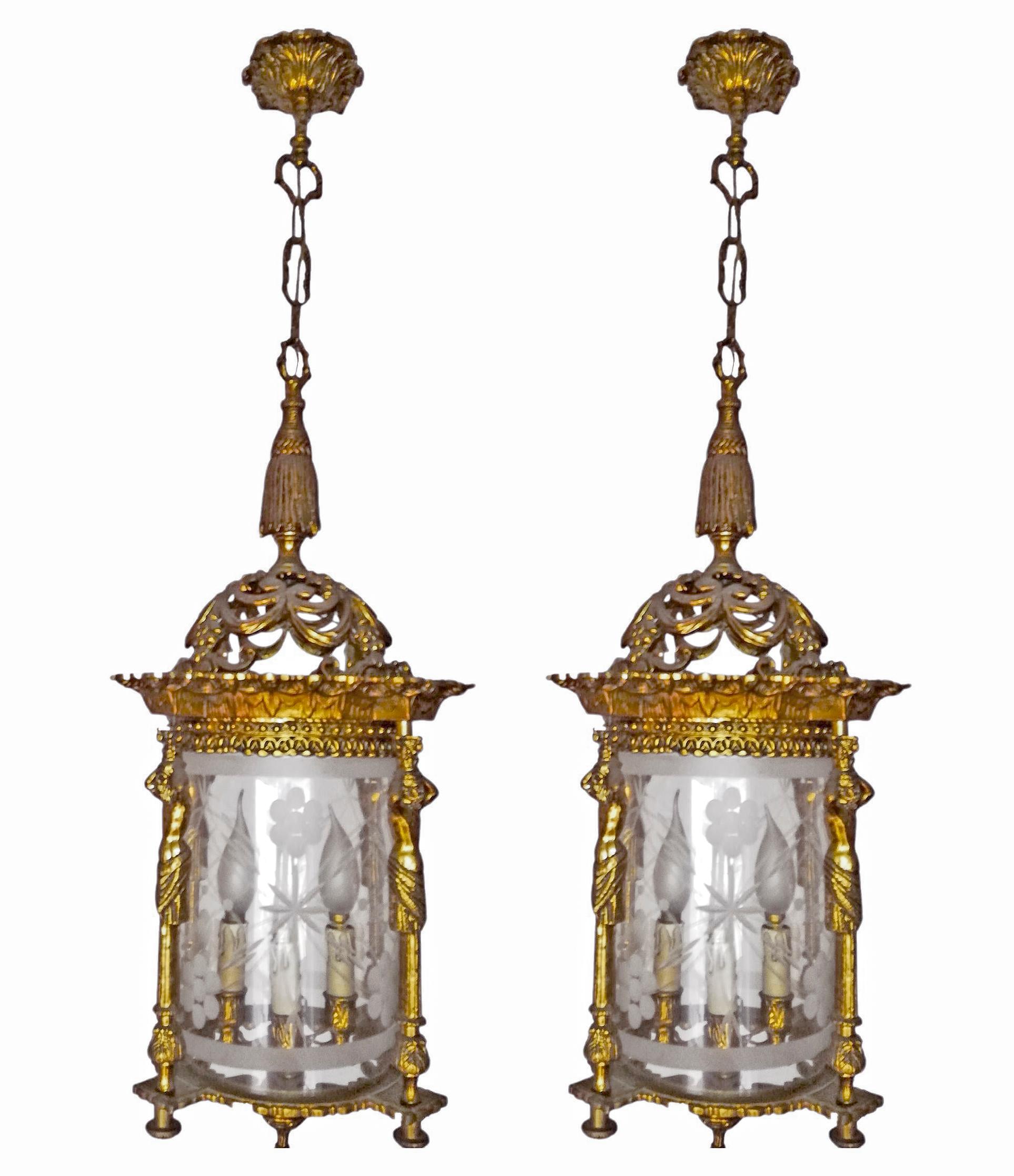 Beautiful pair of antique large French Empire caryatids cast bronze lanterns. Fire gilded solid heavy bronze and cut glass shade with four-light.
Measures:
Diameter 12 in/ 30 cm
Height 32 in/ 80 cm
Weight: 12 Kg / 25 lb/ each
Four-light bulbs E-14 /