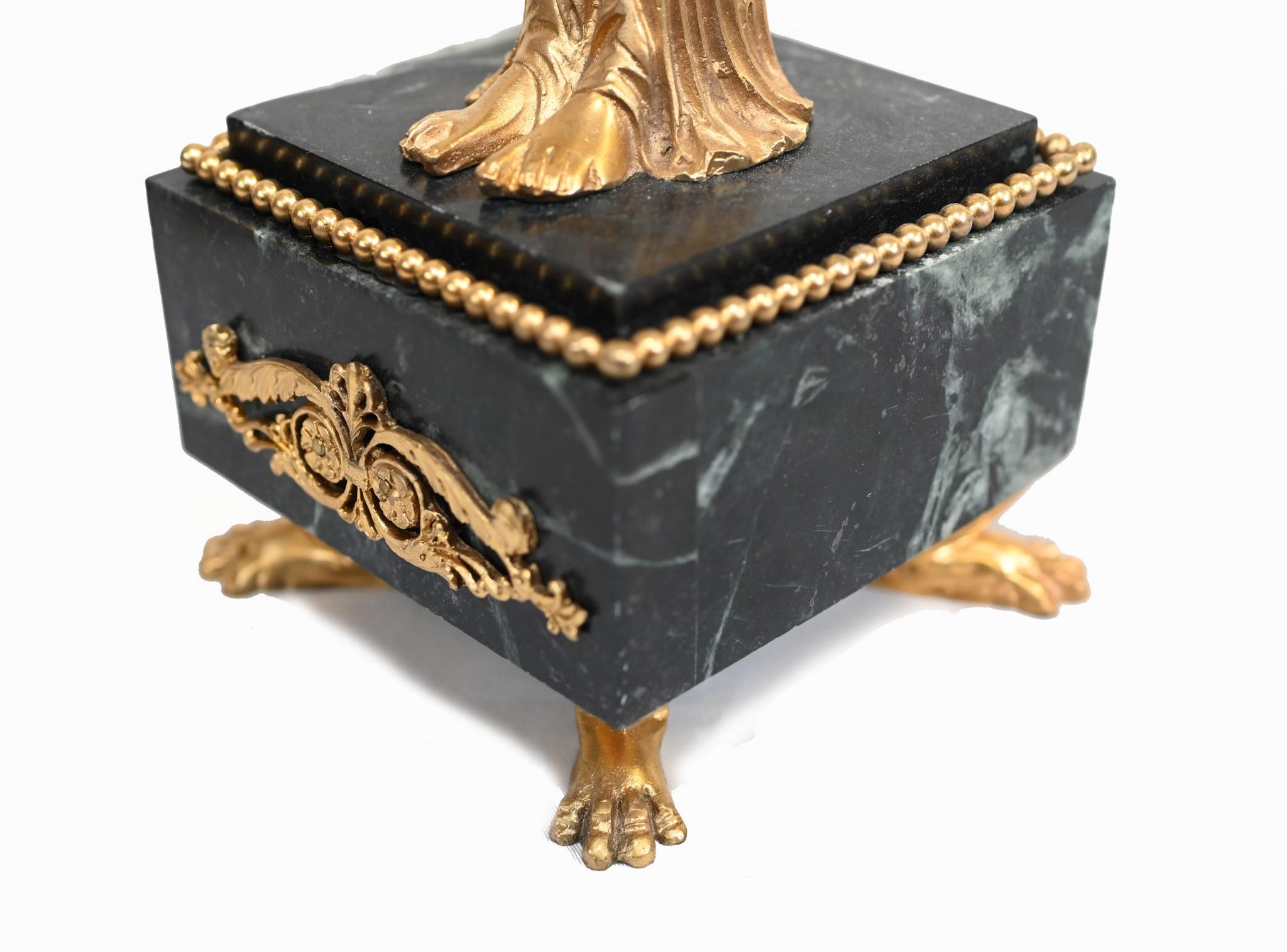 You are viewing an incredible pair of French Empire style ormolu candle sticks standing firmly on a square Italian marble base.
Ornate workmanship to these works of art is astounding.
The candle sticks themselves are three branched and would add