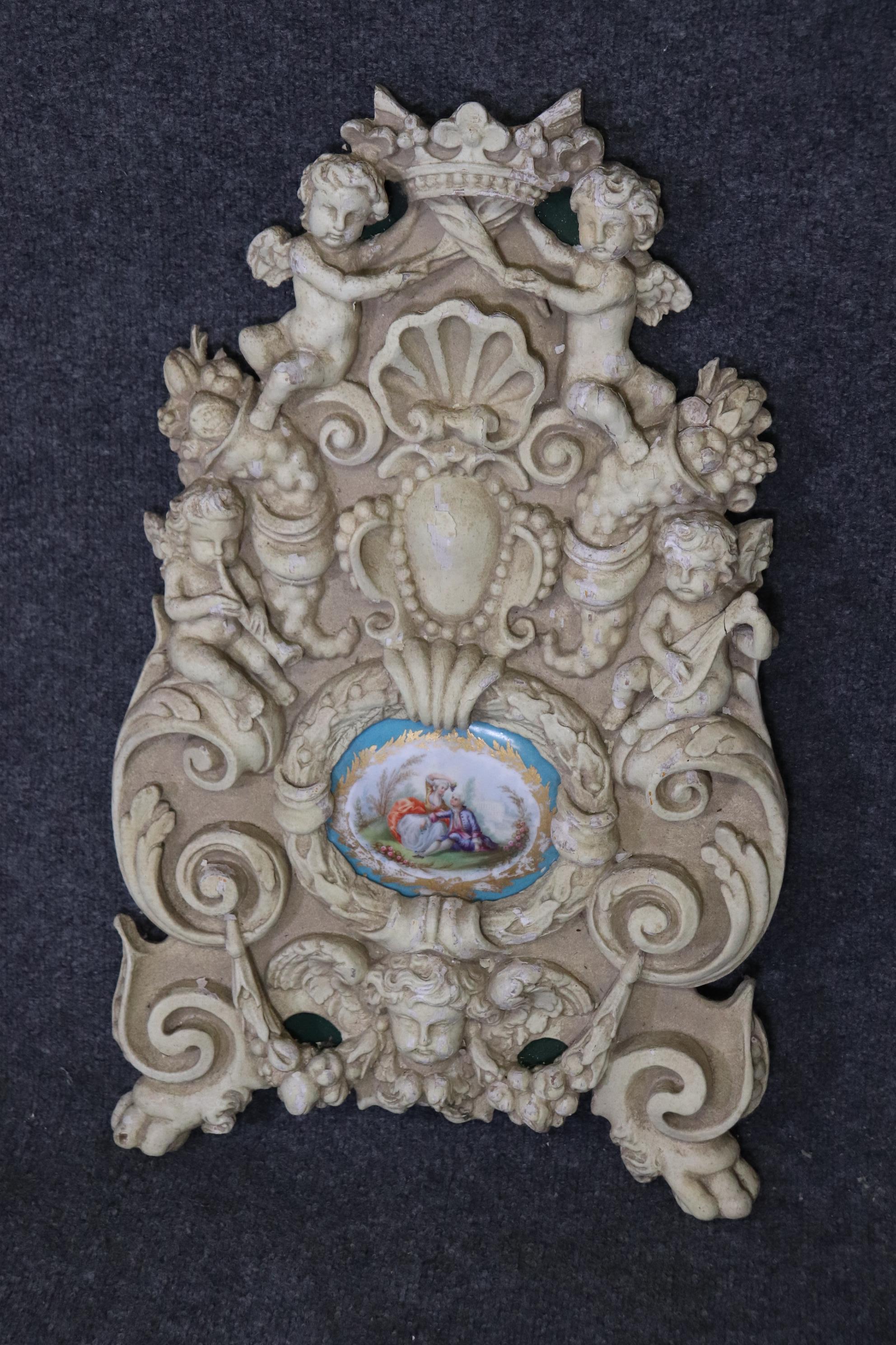 Unknown Pair French Figural Carved Wall Decorations with Sevres Style Plaques For Sale