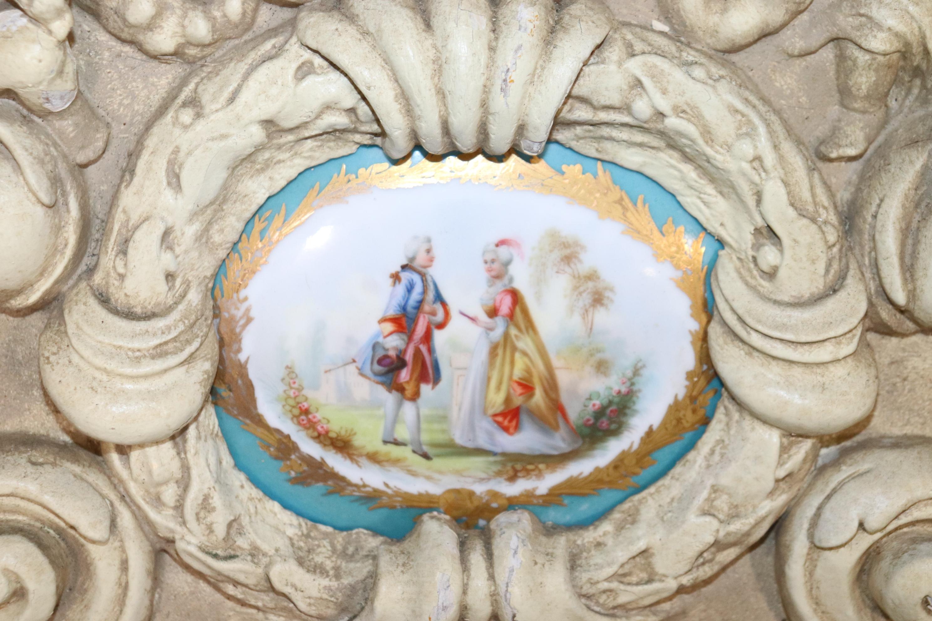 20th Century Pair French Figural Carved Wall Decorations with Sevres Style Plaques For Sale