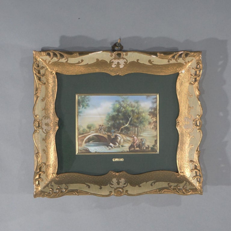 An antique pair of French paintings offer oil on celluloid genre scenes with figures in countryside setting, seated in giltwood frames, artist name plates as photographed, c1940.

Measures- Overall 12.5''H x 14.5''W x 1.75''D.