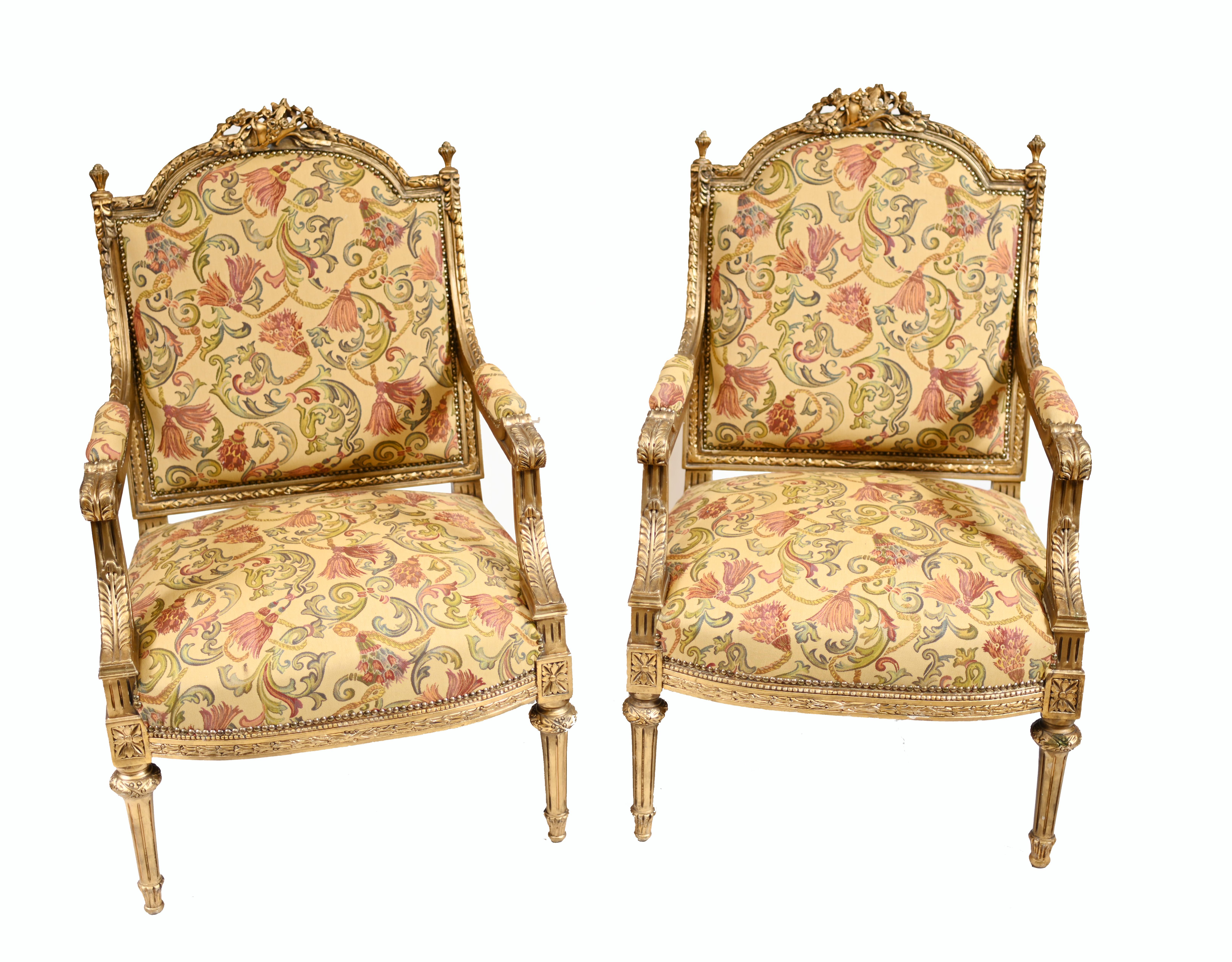Classic pair of French antique arm chairs
handcrafted from gilt with upholstered arms
Freshly re-upholstered with woven floral pattern
Bought from a dealer on Rue de Rossiers at the Paris antiques markets
Great interiors piece
We can ship to