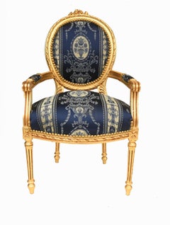 Paar französische vergoldete Armlehnstühle Louis XVI Interiors