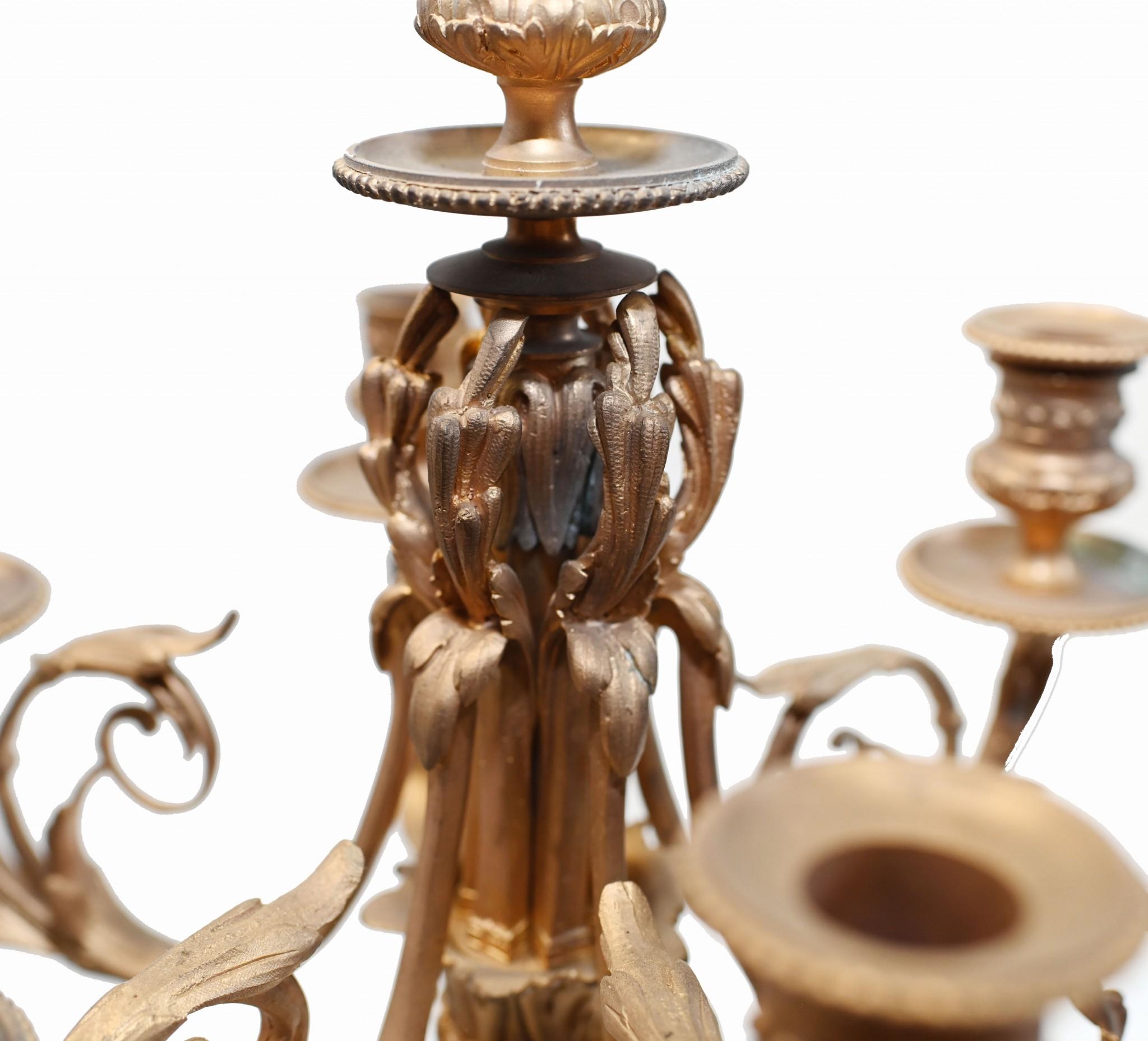 You are viewing an eye catching pair of gilt Empire candelabras
Of figural form, the candelabras are held aloft by the toga clad female maidens
A perfect left and right
Stand on the round pedestal base with encrusted sash, garland and rosettes
Good