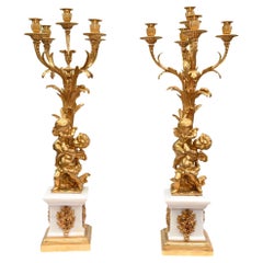 Paar französische vergoldete Cherub-Kandelaber Clodion 1880