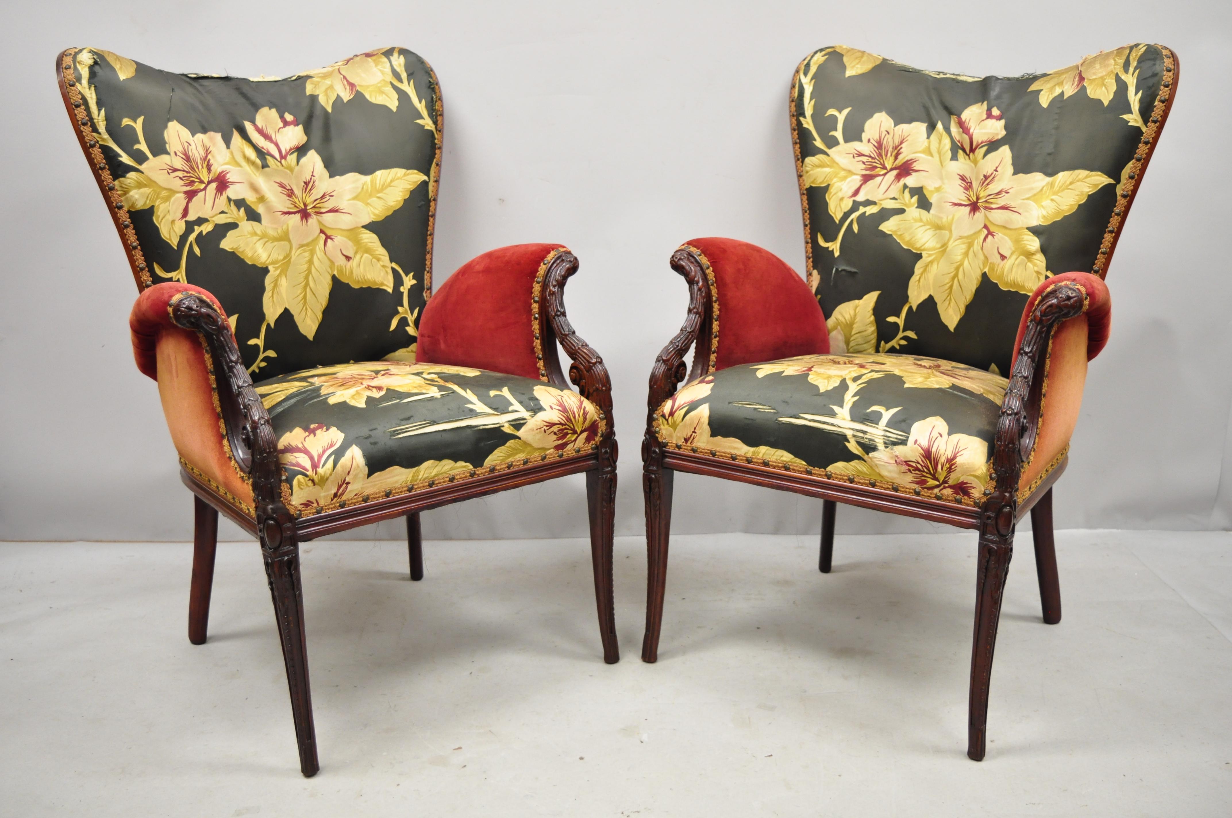 Pair of antique French Hollywood Regency Wingback Grosfeld House style lounge armchairs. Listing includes a solid wood frame, nicely carved details, tapered legs, very nice antique item, great style and form, circa early 20th century. Measurements: