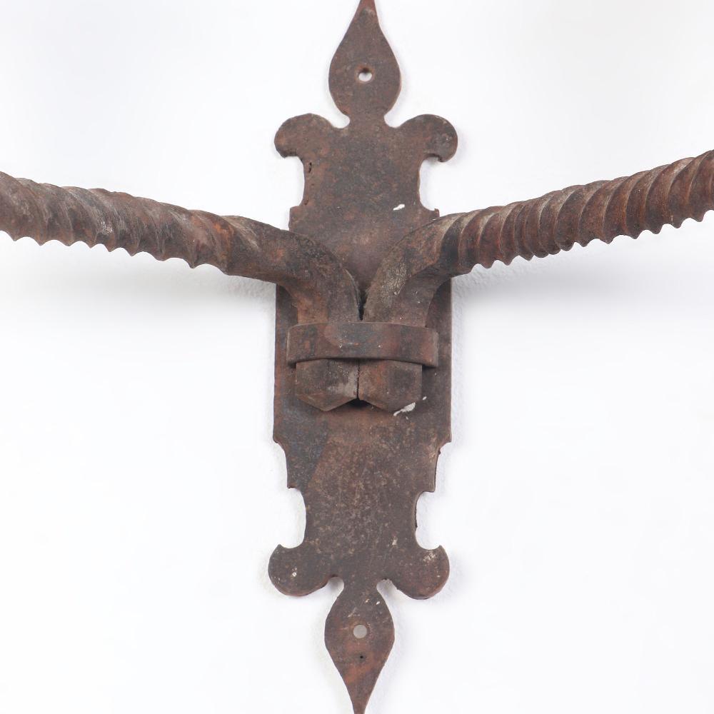 Early 20th Century Pair French iron two arm wall sconces with old traces of gold circa 1910 For Sale