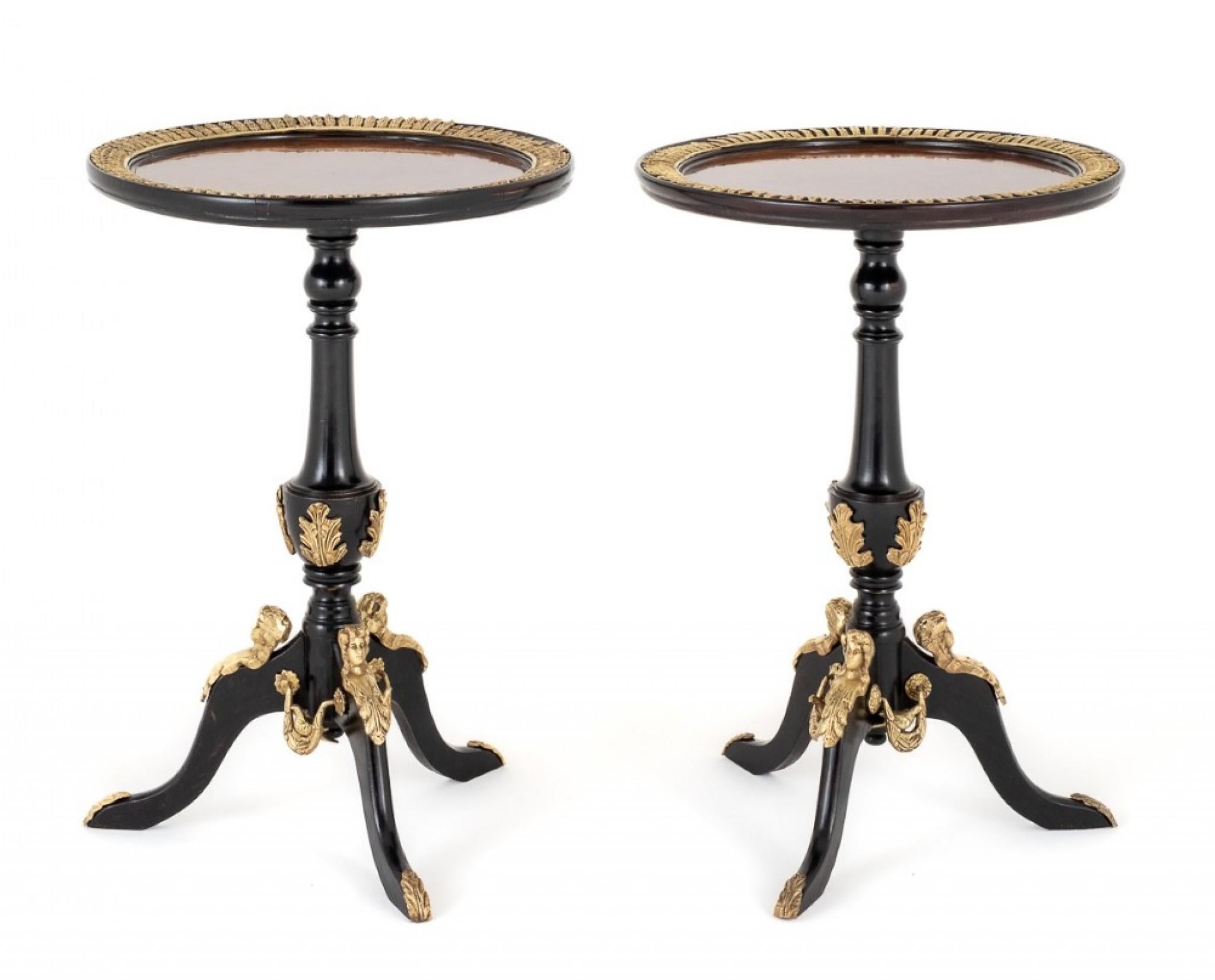 Each table having a turned column and swept legs.
The Tops of The Tables having Figured Oak Veneers.
The Whole of The Tables Being Embelished With Decorative Cast Brass Mounts
circa 1920
Presented in good condition.
Size:
Height 30”
