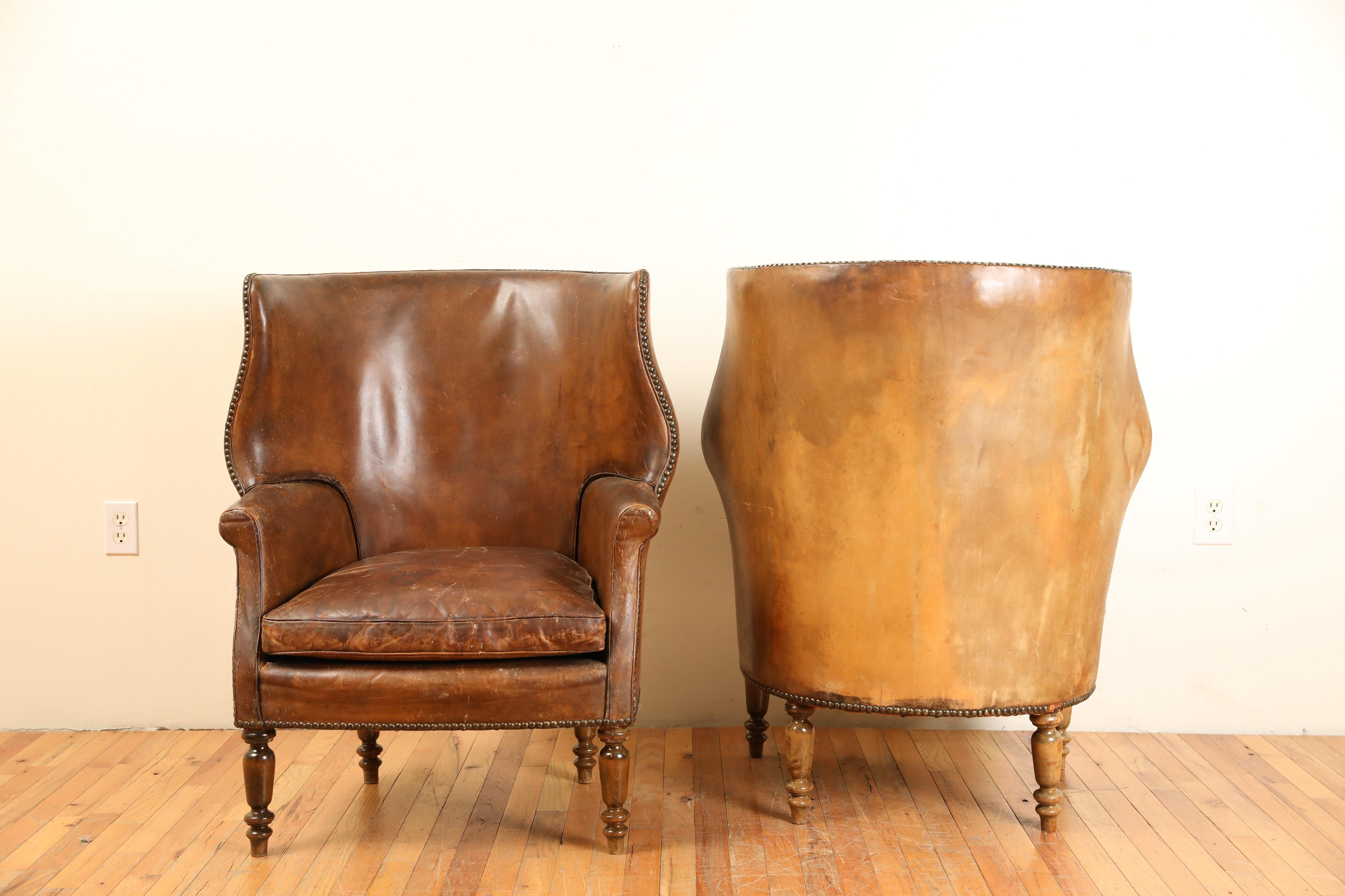 20th Century Pair French Leather Upholstered Wing Chairs in the Georgian Taste, ca. 1900