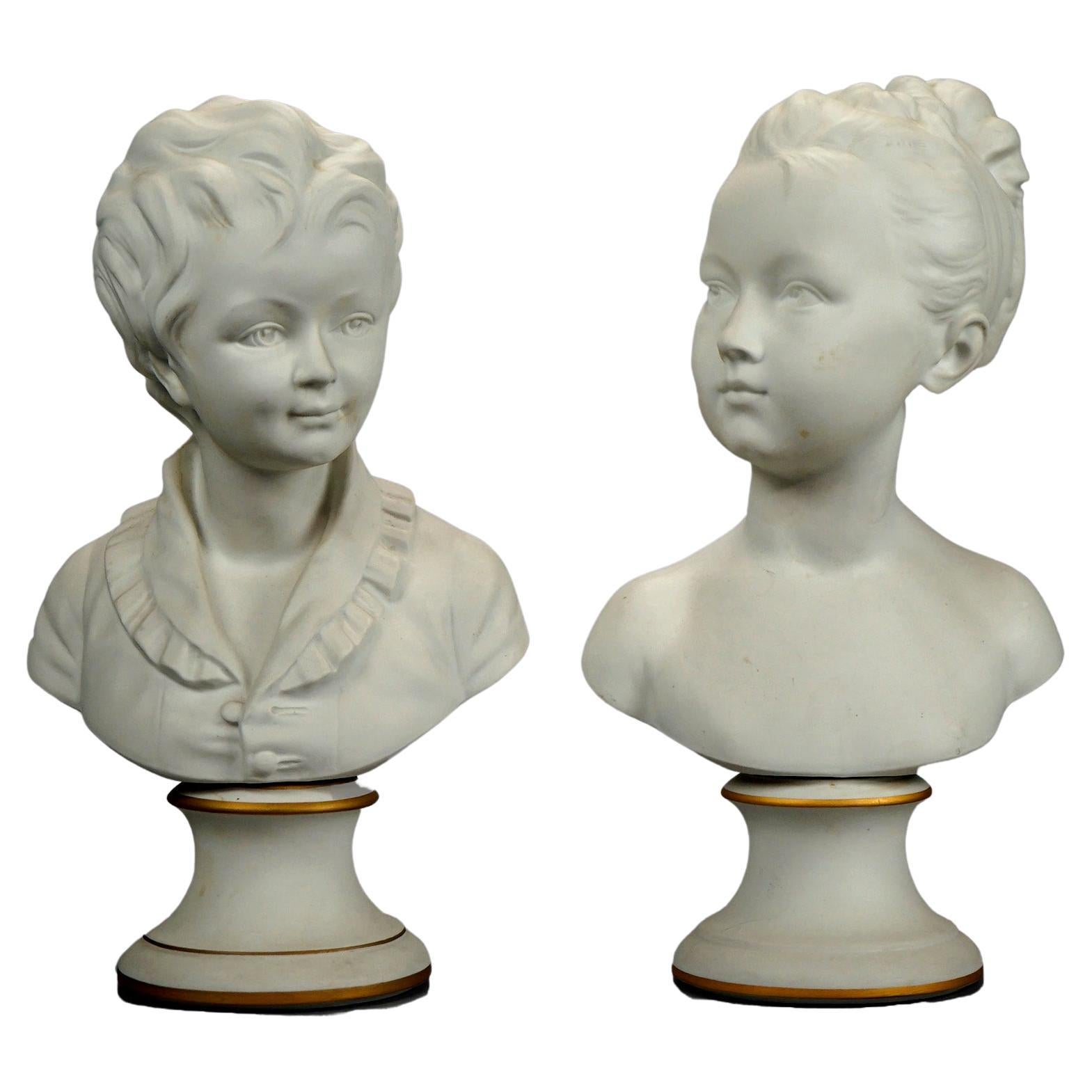 Pair French Limoges Parian Porcelain Bust Sculptures of Young Boy & Girl, 20th C