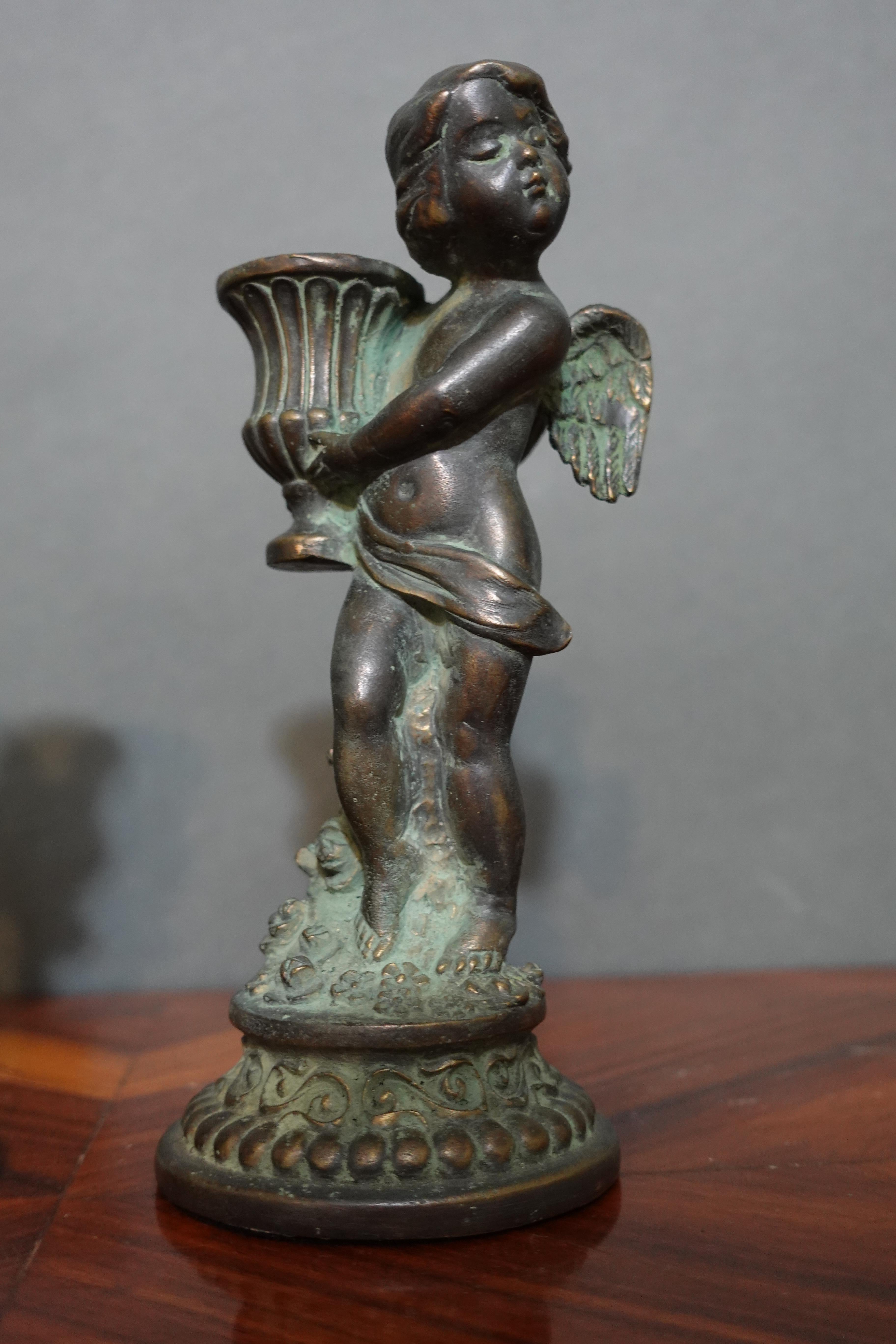 North American Pair French Louis XV Style Bronze Candlesticks, Modelled as Cherubs with Baskets For Sale